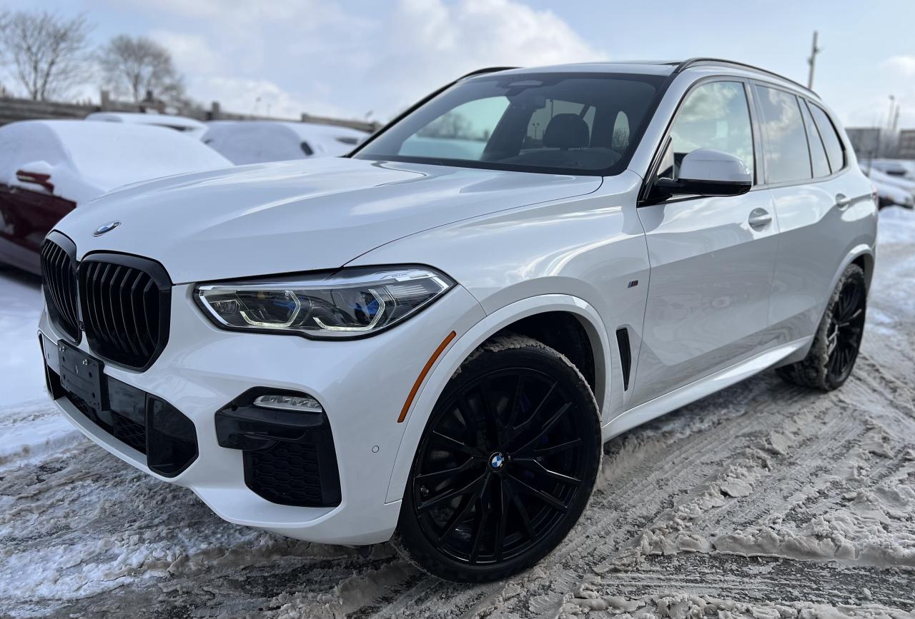 Experience luxury and performance in one package. 2020 BMW X5 M50i xDrive AWD. NO ACCIDENTS! 4.4L V8 523 HP. Local Ontario Vehicle. 111,363 KM. FULLY LOADED WITH HEAD UP DISPLAY | PARKING ASSISTANT PLUS WITH SURROUND VIEW | HEATED AND VENTILATED FRONT SEATS | HEATED REAR SEATS | PANORAMIC SUNROOF | HEATED STEERING WHEEL | SOFT-CLOSE AUTOMATIC DOORS | APPLE CAR PLAY | WIRELESS CHARING | DRIVING ASSISTANT PROFESSIONAL | REMOTE ENGINE START | M SPORTS EXHAUST SYSTEM | M SPORT BRAKE | M SPORT DIFFERENTIAL | 22 INCH ALLOYS WHEELS | CUP HOLDER TEMPERATURE ADJUSTABLE | POWER LIFT-GATE | AND MUCH MORE! <br/> <br/> <br/> Book your appointment today. No hidden fees and no extra charge for cash purchases. <br/> <br/> <br/> ALL IN PRICE $47,850 PLUS HST AND LICENSING. SAFETY CERTIFIED AT NO EXTRA COST! <br/> <br/> <br/> CALL : 647-303-2585 OR 647-631-8755 <br/> <br/> <br/> Brampton Auto Center <br/> 69 Eastern Avenue, Brampton ON, L6W 1X9. Unit 206 <br/> <br/> <br/> Email: info@bramptonautocenter.ca <br/> <br/> <br/> Brampton Auto Center, welcomes you! Family owned dealership located in the GTA. We take pride in our work. Customer service is our priority. Full disclosure with honesty. We are OMVIC registered and proud member of the UCDA. You are welcomed to get the vehicle checked by any mechanic before purchase, for quality assurance. Financing available for all types of credit! Good, bad or no credit. No problem! We will get you approved. Warranty options available for any year, make or model! Contact dealer for more details. <br/>
