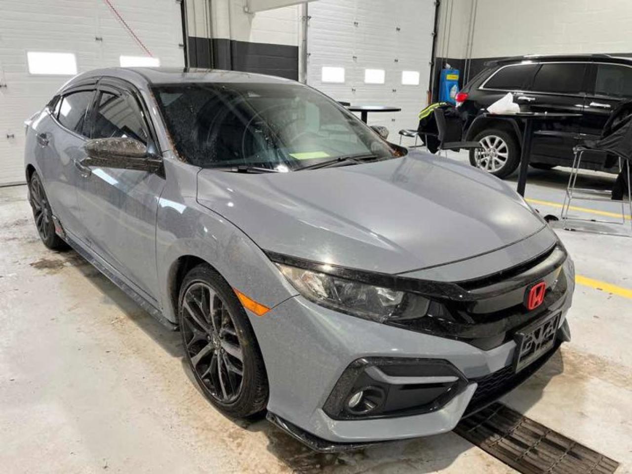 Come see this certified 2020 Honda Civic Hatchback Sport Hatchback | 6-Speed Manual | Carplay and Android Auto | Heated Seats | Sunroof | and More !. Its Manual transmission and 1.5 L engine will keep you going. This Honda Civic Hatchback comes equipped with these options: Sunroof, Air Conditioning, Heated Seats, Tilt Steering Wheel, Steering Radio Controls, Power Windows, Power Locks, Traction Control, Power Mirrors, and Android Auto / Apple CarPlay. See it for yourself at Mark Wilsons Better Used Cars, 5055 Whitelaw Road, Guelph, ON N1H 6J4.MASSIVE SELECTION: 500+ vehicles in ONE LOCATION, all Live Market Priced for the best value!STRAIGHTFORWARD & TRANSPARENT PRICING: Our Advertised Price INCLUDES:Safety Certification! (No separate certification fee upcharge).FREE Carfax History Report!NO upcharge for paying cash!CONFIDENCE & PEACE OF MIND: 30-Day/3,000 km Warranty INCLUDED! Plus a 5-Day Exchange Privilege!*EASY FINANCING: Better-than-bank rates, $0 Down, and 3 Months No Payments available OAC. BAD CREDIT APPROVED HERE!WE BUY CARS: Get Top Dollar for your trade, or sell us your vehicle for CASH even if you dont buy ours!www.shopwilsons.comAn Honest, Transparent Buying Experience. Trusted in business since 1961!(Cash Prices Exclude HST and Licensing Fees only.)