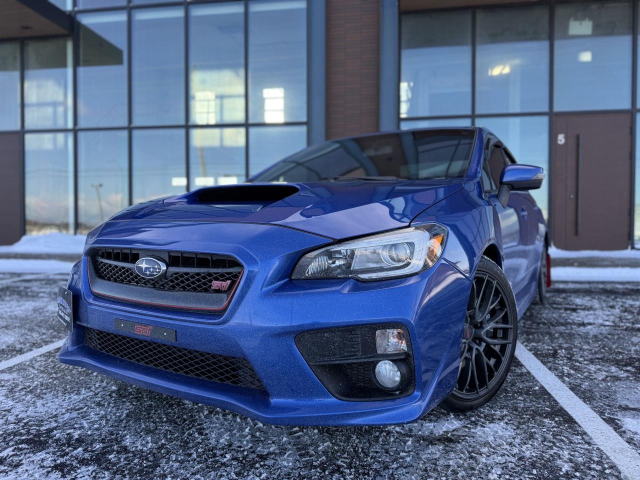 <p dir=ltr style=text-align: center;>Marlin Motors Limited</p><p dir=ltr style=text-align: center;>OMVIC & UCDA Registered</p><p dir=ltr style=text-align: center;>135 Cushman Rd, St Catharines ON</p><p style=text-align: center;><strong>&nbsp;</strong></p><p dir=ltr style=text-align: center;>*2016 Subaru WRX/STi*</p><p style=text-align: center;><strong>&nbsp;</strong></p><p dir=ltr style=text-align: center;>WOW! What an awesome ride! Award winning AWD system & tons of options!</p><p style=text-align: center;><strong>&nbsp;</strong></p><p dir=ltr style=text-align: center;>-Carplay/Android Auto touchscreen stereo</p><p dir=ltr style=text-align: center;>-Heated Seats</p><p dir=ltr style=text-align: center;>-Sunroof</p><p dir=ltr style=text-align: center;>-Rearview Camera</p><p dir=ltr style=text-align: center;>-Blind spot/Cross Traffic Alert</p><p style=text-align: center;><strong><br><br></strong></p><p dir=ltr style=text-align: center;>Just serviced! Including new brakes, rebuilt steering rack, spark plugs, filters & MOTUL oil change.</p><p style=text-align: center;><strong>&nbsp;</strong></p><p dir=ltr style=text-align: center;>*Includes summer wheels/tires as well - Currently has winter tires installed on OEM wheels*</p><p style=text-align: center;><strong><br><br></strong></p><p dir=ltr style=text-align: center;>$17,999 + HST/Licensing</p><p dir=ltr style=text-align: center;>Price Includes Safety & Carfax&nbsp;</p><p style=text-align: center;><strong>&nbsp;</strong></p><p dir=ltr style=text-align: center;>Financing & Warranties Available!</p><p dir=ltr style=text-align: center;>Fill out an application on our website below</p><p dir=ltr style=text-align: center;>Visit our website - <a href=http://marlinmotorsltd.com>marlinmotorsltd.com</a>&nbsp;</p><p style=text-align: center;><strong>&nbsp;</strong></p><p dir=ltr style=text-align: center;>*PLEASE NOTE WE OPERATE BY APPOINTMENT ONLY - CALL OR TEXT 289-407-3002 ANYTIME TO SCHEDULE AN APPOINTMENT*</p><p style=text-align: center;>&nbsp;</p>