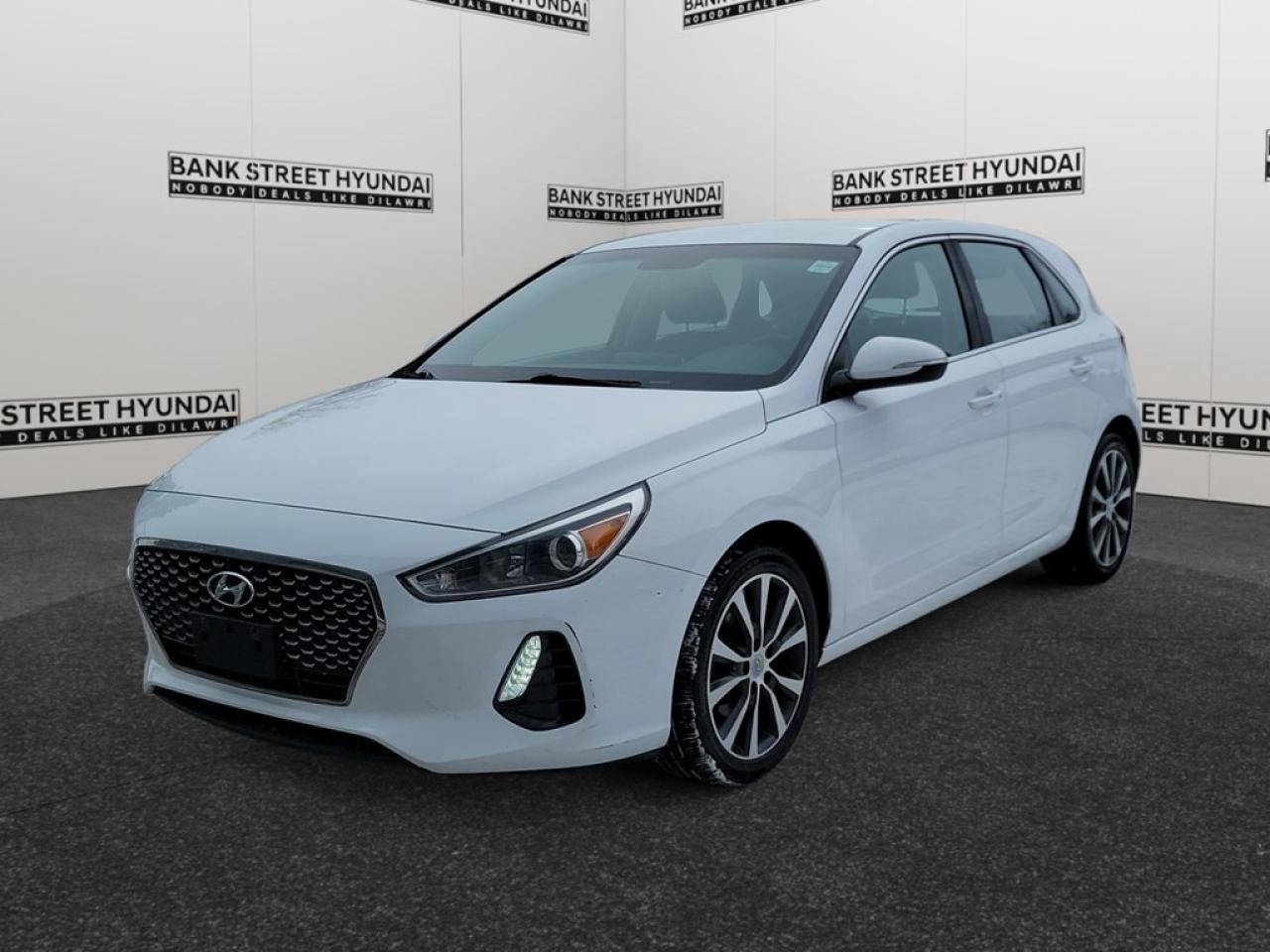 Meet the 2018 Hyundai Elantra GT GL SE in a striking White hue, equipped with front-wheel drive for an agile, responsive ride. This hatchback is designed for those who appreciate practicality without sacrificing style. The exterior boasts eye-catching alloy wheels and heated mirrors, while the refined interior offers heated front seats and a leather steering wheel. The GL SE trim adds a touch of sophistication with leather and piano black accents on the gear shifter. On the technology front, indulge in features like Bluetooth connection, satellite radio, and smart device integration. Enjoy every journey with confidence thanks to advanced safety technologies such as lane assist and a backup camera. Convenient amenities like keyless entry, power windows, and heated steering wheel ensure an elevated driving experience. Ideal for young professionals and small families who value comfort and modern conveniences, this Elantra GT is ready to serve as your reliable road companion. Dont hesitate to reach out to us for further information or to schedule a test drive today!