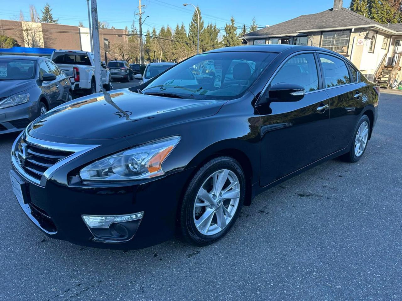 <p> <strong>2015 Nissan Altima SL  LOW KM & VERY CLEAN!</strong> </p><p> <strong>Only 79,596 KM</strong>  Hard to find in this condition!</p><p> <strong>Top Features:</strong><br>  <strong>SL Trim  Fully Loaded</strong><br>  <strong>Factory Alloy Wheels</strong><br>  <strong>Sunroof</strong><br>  <strong>Leather Interior + Heated Seats</strong><br>  <strong>Heated Steering Wheel</strong><br>  <strong>Bluetooth Connectivity</strong><br>  <strong>Reverse Camera + Navigation</strong><br>  <strong>Air Conditioning</strong><br>  <strong>Cruise Control & Tilt Steering</strong><br>  <strong>Power Windows, Locks, Mirrors & Seats</strong><br>  <strong>Automatic Transmission</strong><br>  <strong>5 Passenger Sedan</strong></p><p> Smooth drive, great fuel economy, and <strong>VERY clean inside & out</strong>  this Altima is ready to go!</p><span id=jodit-selection_marker_1769211984241_018303308783196637 data-jodit-selection_marker=start style=line-height: 0; display: none;></span> <p><br></p><p>Excellent, Affordable Lubrico Warranty Options Available on ALL Vehicles!</p><p><span style=background-color: rgba(var(--bs-white-rgb),var(--bs-bg-opacity)); color: var(--bs-body-color); font-family: open-sans, -apple-system, BlinkMacSystemFont, "Segoe UI", Roboto, Oxygen, Ubuntu, Cantarell, "Fira Sans", "Droid Sans", "Helvetica Neue", sans-serif; font-size: var(--bs-body-font-size); font-weight: var(--bs-body-font-weight); text-align: var(--bs-body-text-align);>All Vehicles are Safety Inspected by a 3rd Party Inspection Service.&nbsp;</span><br><br>We speak English, French, German, Punjabi, Hindi and Urdu Language!&nbsp;</p><p><br>We are proud to have sold over 15,000 vehicles to our customers throughout B.C. from this same&nbsp;location in Surrey.<span id=jodit-selection_marker_1747949601815_3502933354387793 data-jodit-selection_marker=start style=line-height: 0; display: none;></span></p><p><br>What Makes Us Different? <br>All of our vehicles have been sent to us from new car dealerships. They are all trade-ins and we are a large remarketing centre for the lower mainland new car dealerships. We do not purchase vehicles at auctions or from private sales. <br> <br>Administration Fee of $450<br> <br>Disclaimer: <br>Vehicle options are inputted from a VIN decoder. As we make our best effort to ensure all details are accurate we can not guarantee the information that is decoded from the VIN. Please verify any options before purchasing the vehicle. <br> <br>B.C. Dealers Trade-In Centre <br>14458 104th Ave. <br>Surrey, BC <br>V3R1L9 <br>DL# 26220</p><p> <br> </p><p>6-0-4-5-8-5-1-8-3-1</p>