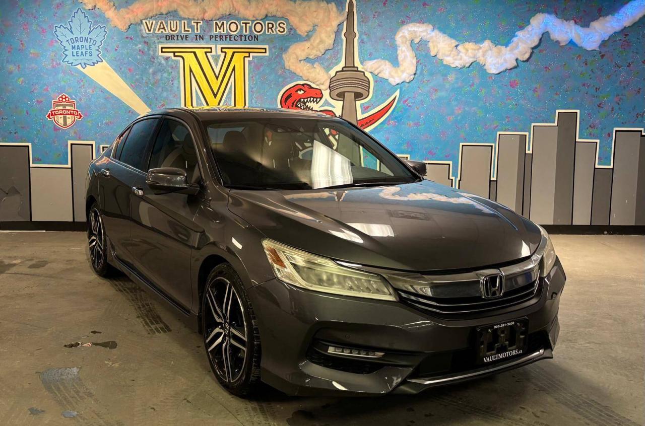 <p>2017 Honda Accord Touring&nbsp;</p><p><p><span>Drive home in the car youve been waiting for with<span>&nbsp;</span></span><strong>$0 Down On Approved Credit</strong><span><span>&nbsp;</span>(OAC)</span><span>! At our dealership, we make it easier than ever to get behind the wheel of a reliable, stylish vehicle without the big upfront cost. Whether youre upgrading, buying your first car, or treating yourself to something new, were here to help you get approved and rolling today. Dont waityour next ride is ready when you are!</span></p><p><span><br></span></p><p><span><span><span>&nbsp;FEATURES - P</span>OWER WINDOWS - POWER LOCKS - CRUISE CONTROL - SUNROOF - KEYLESS ENTRY - PUSH BUTTON START - FRONT WHEEL DRIVE&nbsp;- LANE KEEP ASSIST - FORWARD COLLISION WARNING - HEATED SEATS - APPLE CARPLAY AND ANDROID AUTO - BLUETOOTH AUDIO-&nbsp; 5 PASSENGERS - NAVIGATION - ECO MODE - LEATHER INTERIOR - HEATED FRONT SEATS - HEATED REAR SEATS - WIRELESS CHARGING - MEMORY SEATS - NAVIGATION -&nbsp; MULTI - ANGLE REARVEIW CAMERA - AND LOTS MORE!</span><br></span></p><span id=jodit-selection_marker_1769209400693_8751497598191593 data-jodit-selection_marker=start style=line-height: 0; display: none;></span><br></p> <p>BAD CREDIT, NO CREDIT NOT A PROBLEM. APPLY TODAY ON OUR WEBSITE WWW.VAULTMOTORS.CA OR COME VISIT OUR DEALERSHIP! &nbsp;</p><p> <br></p><p>WE WORK WITH ALL MAJOR BANKS TO GET YOU APPROVED!&nbsp;DEPENDS ON YOUR CREDIT HISTORY. CONTACT US TODAY AND LET OUR FAMILY SHOW YOU THE DIFFERENCE. Prices are plus HST & Licensing.&nbsp;<span id=jodit-selection_marker_1686168059819_6514763025256252 data-jodit-selection_marker=start style=line-height: 0; display: none;></span> </p><p><br></p><p>Please check our website www.vaultmotors.ca&nbsp; Please verify any information in question with our sales associates.</p><p> <br></p><p>All vehicles can be certified and E-tested for an additional fee from $895, depending on the make and model. If not Certified and E-tested, as per OMVIC Regulations, the vehicle is deemed to be not drivable, not E-tested, and Not Certified.&nbsp;&nbsp;</p><p> <br></p><p>-PROFESSIONALLY CLEANED INSIDE AND OUT -CAR PROOF HISTORY REPORT PROVIDED WITH EACH VEHICLE &nbsp; Trade-ins - We take any year and model! Bring in your old vehicle for a free appraisal. &nbsp;</p><p><br></p><p>#TeamVault #FamilyCars #SportsCars&nbsp;#Honda #Toyota #Hyundai #Nissan #BMW #Mercedes #Volkswagen #Porsche #Acura #Mississauga #Toronto #Showroom</p><p><br></p><p>BUY WITH CONFIDENCE!</p><p> &nbsp; <br></p><p>We are OMVIC registered and a member of Used Car Dealer Association</p><p>. &nbsp; &nbsp;&nbsp; VAULT MOTORS&nbsp; DRIVE IN PERFECTION &nbsp; </p><p>www.vaultmotors.ca </p><p><br></p><p>1650 Dundas Street East Mississauga ON L4X 2Z3&nbsp; </p><p>&nbsp;<br></p><p> Telephone 905-281-3030 </p><p><br></p><p>Monday to Saturday: 10:00AM TO 8:00PM</p><p> Sunday Appointment</p>