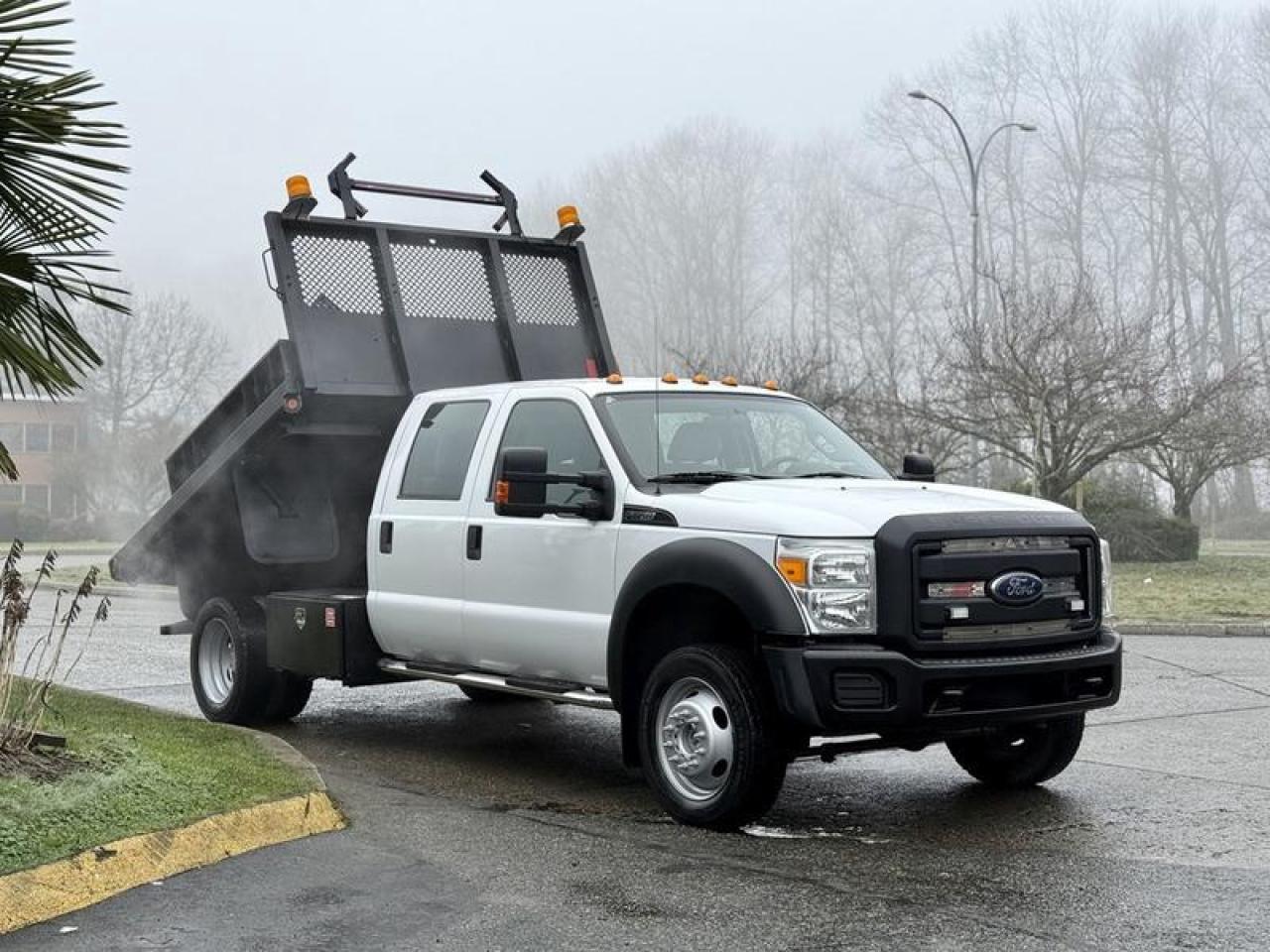 This 2015 Ford F-550 Super Duty Crew Cab 4x4 is a commercial flat deck truck equipped with a hydraulic dump function, making it suitable for construction, landscaping, municipal, and utility applications. It is powered by a 6.8L V10 gasoline engine and paired with an automatic transmission, with four-wheel drive for job sites and variable conditions.

The flat deck measures 9 ft 2 in long by 7 ft 8 in wide and includes dump controls, storage compartments, and a traffic control arrow board for on-site visibility and safety. Additional features include auxiliary switches, beacon light, and a crew cab configuration offering air conditioning, power windows, door locks, and mirrors, along with an AM/FM radio. A flexible setup for crews requiring a flat deck platform with added dump capability. This item is currently OFFSITE. You must register an appointment with our office to schedule an offsite viewing. Appointments must be made a minimum of one business day in advance (and as defined by the days that Repo.com is open for business) before your appointment can be scheduled and confirmed. We may, at our own discretion, instead opt to transport smaller items to Repo.coms main yard for viewing purposes.  $39,920.00 plus $375 processing fee, $40,295.00 total payment obligation before taxes.  Listing report, warranty, contract commitment cancellation fee, financing available on approved credit (some limitations and exceptions may apply). All above specifications and information is considered to be accurate but is not guaranteed and no opinion or advice is given as to whether this item should be purchased. We do not allow test drives due to theft, fraud, acts of vandalism and undetectable impaired driving. Instead we provide the following benefits: Complimentary Warranty (with options to extend), Limited Money Back Satisfaction Guarantee on Fully Completed Contracts, Contract Commitment Cancellation, and an Open-Ended Sell-Back Option. Ask seller for details or call 604-522-REPO(7376) to confirm listing availability.
