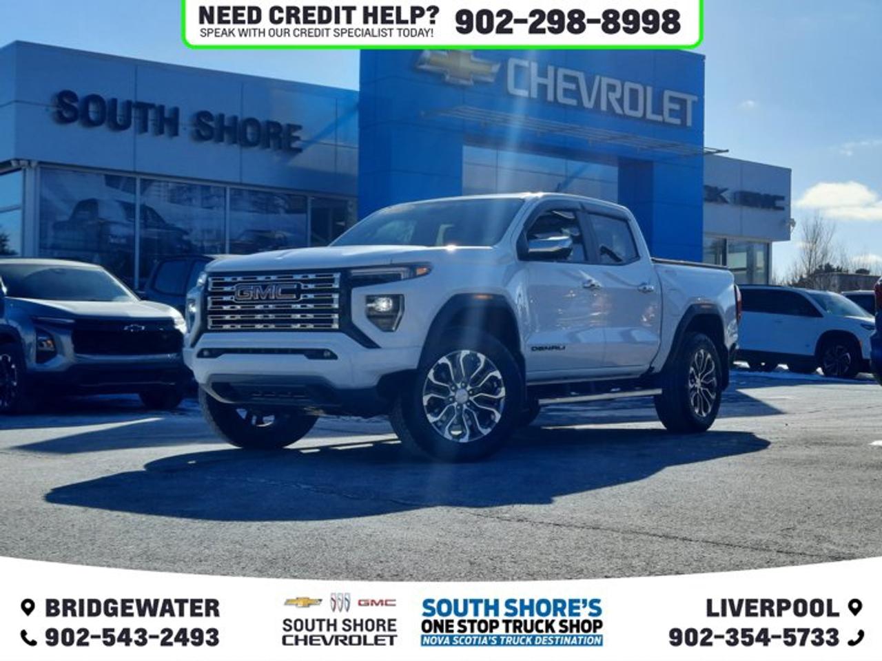 Recent Arrival! Summit White 2023 GMC Canyon Denali For Sale, Bridgewater 4WD 8-Speed Automatic 2.7L Turbo Clean Car Fax, 4WD, 120-Volt Bed Mounted Power Outlet, 2 Rear USB Ports in Centre Console (Charge-Only), 5 Rectangular Chrome Assist Steps, 6-Way Power Passenger Seat Adjuster, 7 Speakers, 8-Way Power Driver Seat Adjuster, ABS brakes, Adaptive Cruise Control, Air Conditioning, Alloy wheels, Auto-dimming Rear-View mirror, Automatic Emergency Braking, Automatic Locking Rear Differential, Automatic Stop/Start, Automatic temperature control, Blind Zone Steering Assist, Brake assist, Bumpers: body-colour, Canyon Pro Safety, Compass, Delay-off headlights, Driver & Front Passenger Illuminated Visors, Driver & Front Passenger Ventilated Seats, Driver door bin, Driver Memory, Driver Seatback Map Pocket, Dual front side impact airbags, Dual-Zone Automatic Air Conditioning, Electronic Stability Control, EZ-Lift & Lower Tailgate, Following Distance Indicator, Forward Collision Alert, Front Bucket Seats, Front fog lights, Front LED Fog Lamps, Front Pedestrian & Bicyclist Braking, Genuine wood dashboard insert, HD Surround Vision, Heated door mirrors, Heated Driver & Front Passenger Seats, Heated Power-Adjustable Outside Mirrors, Heated Steering Wheel, Illuminated entry, Inside Rear-View Auto-Dimming Mirror, Integrated Trailer Brake Controller, IntelliBeam Automatic High Beam On/Off, Interior Overhead Courtesy Light w/Dual Reading Lamp, Lane Keep Assist w/Lane Departure Warning, Low tire pressure warning, Manual Rear-Sliding Window, Multicolour 6.3 Diagonal Head-Up Display, MultiStow Tailgate, Navigation System, Occupant sensing airbag, Outside temperature display, Overhead console, Perforated Leather-Appointed Seat Trim, Power Driver Lumbar Control Seat Adjuster, Power driver seat, Power Inner Sliding Glass Sunroof w/Manual Shade, Power Passenger Lumbar Control Seat Adjuster, Power steering, Power windows, Preferred Equipment Group 5SB, Premium 7-Speaker Bose Sound System, Radio data system, Rear Centre Fold-Down Armrest w/2 Cupholders, Rear Cross Traffic Braking, Rear of Console 120-Volt Power Outlet, Rear Pedestrian Alert, Rear step bumper, Rear window defroster, Rear-Window Electric Defogger, Remote Vehicle Starter System, Safety Alert Seat, Security system, Speed control, Spray-On Bedliner, Steering wheel mounted audio controls, Tachometer, Tailgate Keyed Cylinder Lock, Tilt & Telescopic Manual Steering Column, Tilt steering wheel, Traction control, Trailering Package, Trip computer, Ultrasonic Rear Park Assist, Variably intermittent wipers, Ventilated front seats, Wireless Charging.
