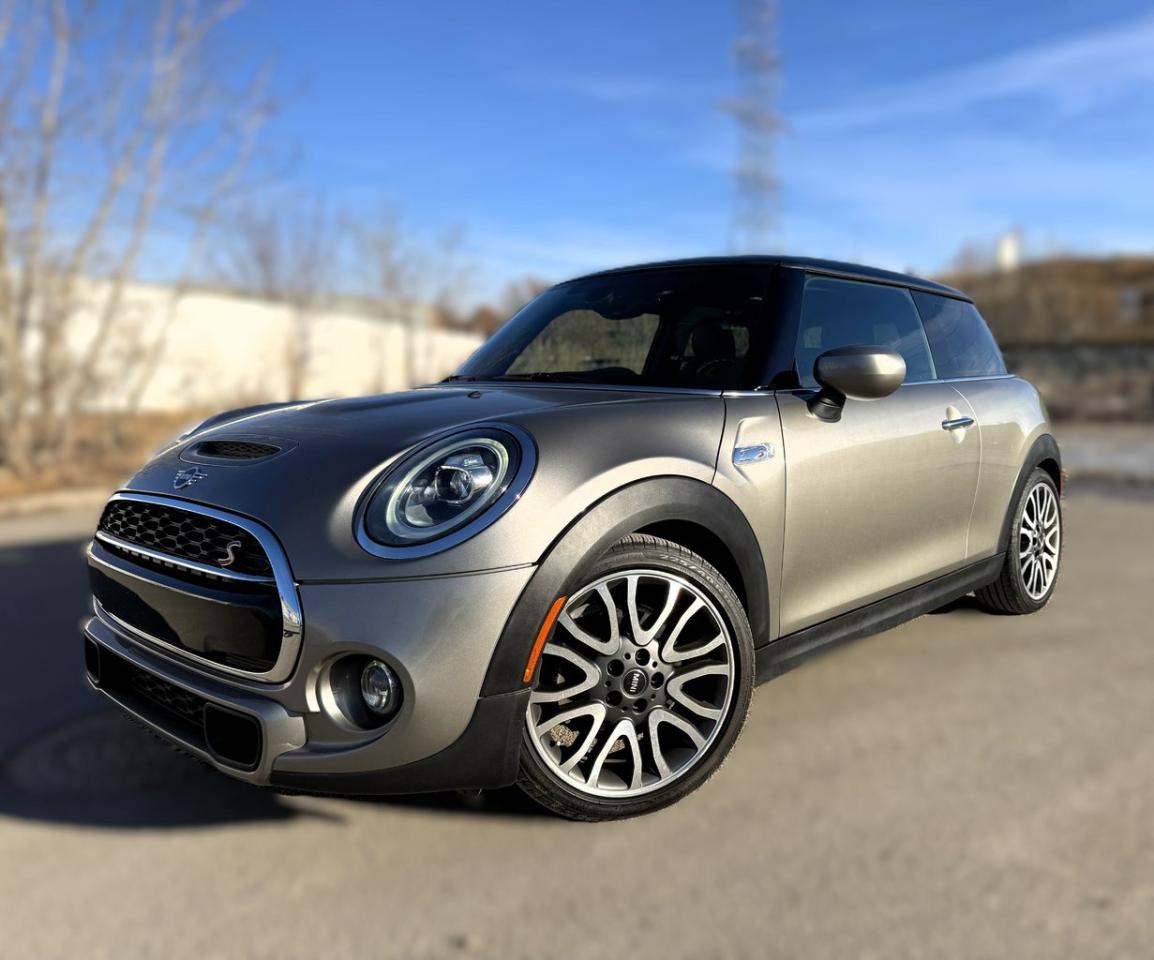 <p><span style=color:black;><span style=font-family:Cambria,serif;>2020 MINI COOPER S Automatic- Come check out this fully certified MINI Cooper S that comes very nicely equipped with THOUSANDS IN UPGRADES, Powered by a sporty 2.0L-Turbo mated to an Automatic 7-Speed DCT Transmission w/Green Eco engine Auto Start-Stop Driving Modes for increased fuel economy, Adaptive Suspension, Technology Package with MINI Connected Navigation Plus w/Voice Control, Mini Connected XL, Smartphone Connected Drive Services w/Remote Services & Real-Time Traffic Information, Parking Assist Package including Reversing Camera w/Rear Park Distance Control (PDC) Crank up those tunes and experience amazing sound with the Harman Kardon Sound System w/Apple CarPlay/Satellite Radio & USB Connect w/Wireless Music Streaming, Bluetooth Hands Free Phone w/Smartphone Integration & Wireless Charging, Cruise Control with Brake Assist, Never take the keys out of your pocket with the very convenient Keyless Comfort Access w/Push Button Start, Led Interior Mini Excitement Package, Essentials Package w/Dual Panorama Sunroofs, Rain Sensing Wipers, A/C w/Automatic Dual Zone Climate Control, Multi-Function Leather Wrapped Sport Steering Wheel w/Tilt & Telescopic, 18 MINI Cosmos Spoke Alloy wheels, Finished in the Melting Silver Metallic w/Carbon Black Heated Sport Seats, you will love the added safety and worry free driving the FWD with Performance Control will bring you, Experience Minis legendary performance & fuel economy *BUY WITH CONFIDENCE* as every vehicle has guaranteed title with available extended warranty and includes a copy of the extensive Mechanical Fitness Assessment (MFA) & CarFax history report</span></span><a target=_blank rel=noopener noreferrer href=https://vhr.carfax.ca/?id=mGG4Eb0OXMuSZ4f7zKZldoxew28FB9zS>https://vhr.carfax.ca/?id=mGG4Eb0OXMuSZ4f7zKZldoxew28FB9zS</a><span style=color:black;><span style=font-family:Cambria,serif;>, 97,509 Kms, Priced at $24,995.00,</span></span><span style=font-family:Cambria,serif;font-size:10.5pt;>Competitive financing rates available with $0 down,for additional inventory listings & verifiable customer reviews visit or like us on our Facebook business page at</span><a target=_blank rel=noopener noreferrer href=https://nam12.safelinks.protection.outlook.com/?url=https%3A%2F%2Fwww.facebook.com%2FBCWLUXURY%2F&data=05%7C01%7C%7C49037207e269409d393408da2abbf030%7C84df9e7fe9f640afb435aaaaaaaaaaaa%7C1%7C0%7C637869283919776206%7CUnknown%7CTWFpbGZsb3d8eyJWIjoiMC4wLjAwMDAiLCJQIjoiV2luMzIiLCJBTiI6Ik1haWwiLCJXVCI6Mn0%3D%7C3000%7C%7C%7C&sdata=KT5A32yHJFN2iw5utjLCQnk2B12DF0kAGQ4FVcFdstY%3D&reserved=0><span style=color:blue;><span style=font-family:Cambria,serif;font-size:10.5pt;text-decoration:none;text-underline:none;>https://www.facebook.com/BCWLUXURY/</span></span></a><span style=font-family:Cambria,serif;font-size:10.5pt;> and </span><a target=_blank rel=noopener noreferrer href=https://na01.safelinks.protection.outlook.com/?url=https%3A%2F%2Fbcwautomotivegroup.ca%2F%3Ffbclid%3DIwAR387Lb1rwVh_JOSPNqDyBxMntmO0XIjsSe7G6mkcS-nxBBxGrWPzUEGvik&data=04%7C01%7C%7C494dd18690344bf6f7e508d9785a98d6%7C84df9e7fe9f640afb435aaaaaaaaaaaa%7C1%7C0%7C637673152772014668%7CUnknown%7CTWFpbGZsb3d8eyJWIjoiMC4wLjAwMDAiLCJQIjoiV2luMzIiLCJBTiI6Ik1haWwiLCJXVCI6Mn0%3D%7C1000&sdata=HJx1B3W2XCrSc%2FpJw3y2BzSW9IVH4kDlJxkMZV196So%3D&reserved=0><span style=color:blue;><span style=background:white;border:none windowtext 1.0pt;font-family:Cambria,serif;font-size:11.5pt;padding:0cm;>https://bcwautomotivegroup.ca/</span></span></a><span style=font-family:Cambria,serif;font-size:10.5pt;>BCW Automotive Group is your Mini Cooper Specialist! Now is the time to join the charismatic club of Mini Owners. Ph 403-606-9008 to make an appointment most anytime for your personalized viewing (including holidays/evenings & weekends) to serve you best by appointment only!We Know You Will Enjoy Your Test Drive Towards Ownership! AMVIC Licensed Dealer Stock #</span> <span style=font-family:Cambria,serif;font-size:10.5pt;>MSA20.<o:p></o:p></span></p>