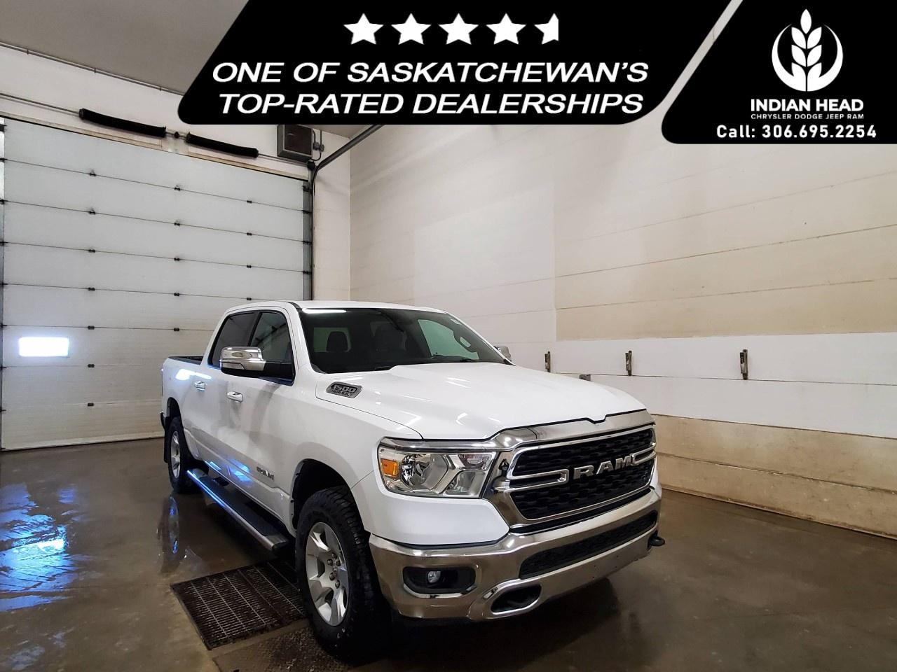 <p>The 2022 Ram 1500 Big Horn 4x4 Crew Cab 5'7" Box in a classic white finish offers a robust and reliable driving experience with its capable 4×4 drivetrain and smooth handling. Perfect for those seeking both style and utility, this truck exudes confidence on and off the road.</p> <p>Step inside to find a spacious interior adorned in elegant gray, where comfort meets practicality. The leather steering wheel and thoughtful styling elements elevate your driving experience. Whether you're heading out for a long journey or a quick drive around town, the interior is designed to keep you comfortable all the way.</p> <p>Equipped with modern technology, this Ram 1500 features a backup camera and Bluetooth connection for seamless connectivity and enhanced safety. Additional comforts like air conditioning and power windows ensure every drive is pleasurable. The truck also boasts brake assist and keyless entry, reinforcing its alignment with convenience and safety.</p> <p>This truck is an ideal choice for professionals and families alike who value power, practicality, and advanced technology in their vehicle. Contact our dealership today to learn more about how the 2022 Ram 1500 Big Horn can meet your driving needs.</p>