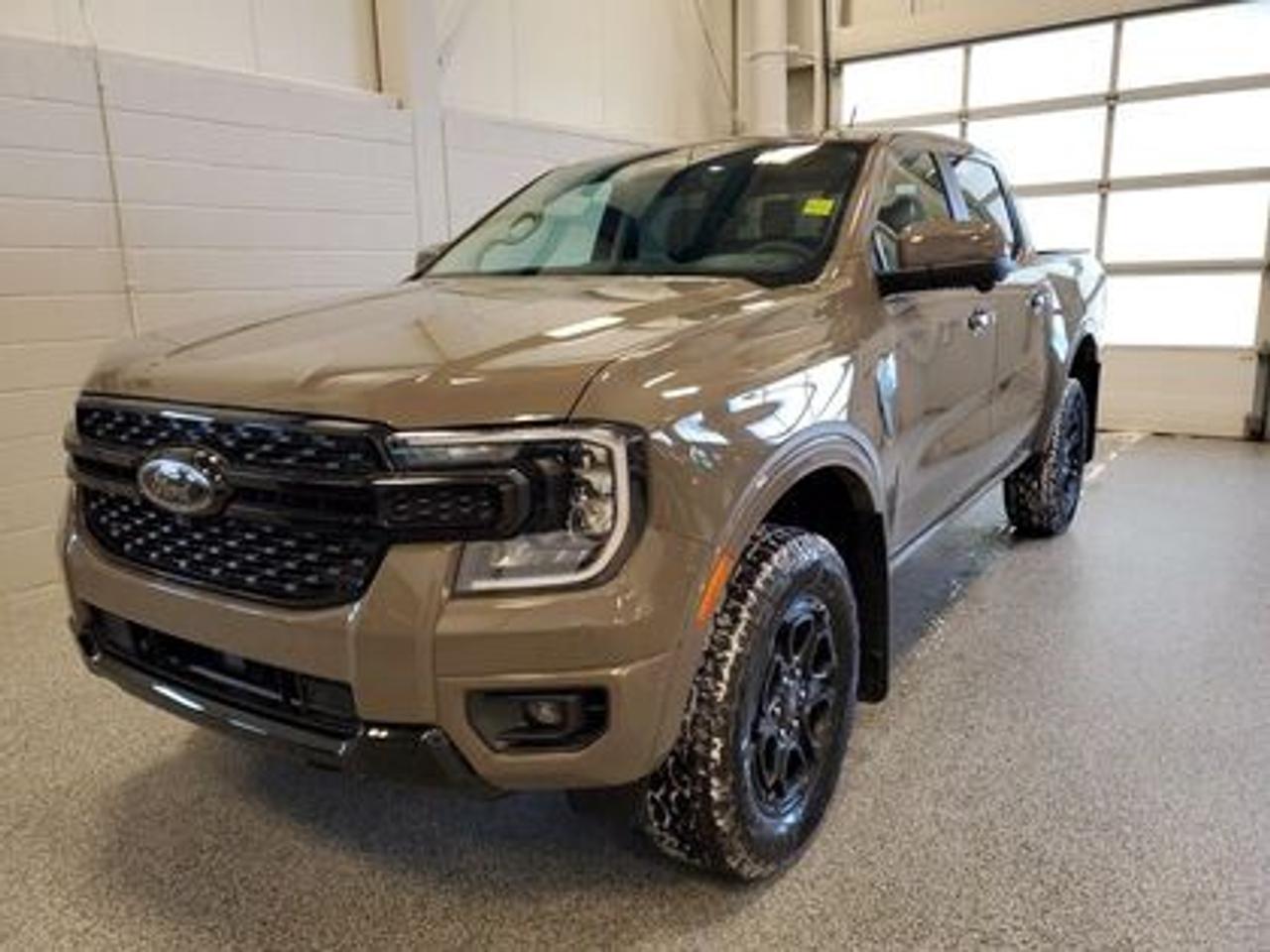 This all-new 2026 Ford Ranger Lariat 500A looks absolutely stunning in Marsh Grey. This versatile compact pickup comes equipped with the 2.3L EcoBoost® engine, producing 270 horsepower and 310 lb-ft of torque. By leveraging EcoBoost® technology and a 10-speed automatic transmission, this truck is designed to achieve 11.2L/100 km (25 miles per gallon) combined highway/city fuel economy.

Key Features:
12 Centre Display
Dual Zone Temperature Control 
Rear Window W/Privacy Glass & Defrost
Ford Co-Pilot360
360 Degree Camera
Lane Keeping System 
Rear Parking Sensors
Adaptive Cruise Control and Speed Sign Recognition
Reverse Break Assist 
B&O® System by Bang & Olufsen with HD Radio
Intelligent Access with Push-Button Start
10-Way Power Drivers Seat 
Heated Front Seats 
17 Grey Painted Aluminum Wheels
Cruise Control
Universal Garage Door Opener
FordPass Connect
Selectable Drive Modes
12 Cluster Display
FX4  Off Road Package
Black Appearance Package
Advanced Towing and Tech Package
Engine Block Heater

Moose Jaw Ford, conveniently located at 1010 North Service Road in Moose Jaw, is your trusted destination for all your automotive needs. With an impressive 4.8-star Google rating from nearly 1,500 reviews, we are proud to deliver an exceptional vehicle-buying experience tailored just for you. Our Moose Jaw Motives set us apart, offering unbeatable value like half-priced oil changes for life on pre-owned vehicles, one year of key and remote protection, and one year of tire and rim protection. Enjoy peace of mind with every purchase. At Moose Jaw Ford, were committed to driving positive change in our community by combining exceptional service, high-quality vehicles, and a guest-first approach. Visit us today!