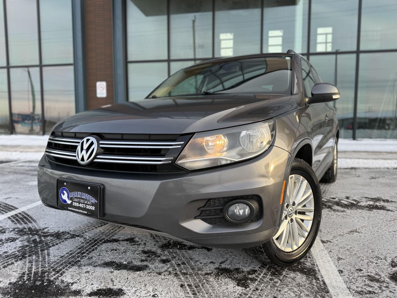 <p dir=ltr style=text-align: center;>Marlin Motors Limited</p><p dir=ltr style=text-align: center;>OMVIC & UCDA Registered</p><p dir=ltr style=text-align: center;>135 Cushman Rd, St Catharines ON</p><p style=text-align: center;><strong>&nbsp;</strong></p><p dir=ltr style=text-align: center;>*2015 Volkswagen Tiguan AWD*</p><p style=text-align: center;><strong>&nbsp;</strong></p><p dir=ltr style=text-align: center;>Nice sporty all wheel drive SUV! Loaded with great options and lots of space.</p><p style=text-align: center;><strong>&nbsp;</strong></p><p dir=ltr style=text-align: center;>-All Wheel Drive</p><p dir=ltr style=text-align: center;>-Push Button Start</p><p dir=ltr style=text-align: center;>-Bluetooth</p><p dir=ltr style=text-align: center;>-Backup Camera</p><p dir=ltr style=text-align: center;>-Heated Seats</p><p dir=ltr style=text-align: center;>-Moonroof</p><p style=text-align: center;><strong><br><br></strong></p><p dir=ltr style=text-align: center;>Just serviced! Including new all weather tires, new brakes, fresh oil change, air filters & complete detail.</p><p style=text-align: center;><strong><br><br></strong></p><p dir=ltr style=text-align: center;>$7,999 + HST/Licensing</p><p dir=ltr style=text-align: center;>Price Includes Safety & Carfax&nbsp;</p><p style=text-align: center;><strong>&nbsp;</strong></p><p dir=ltr style=text-align: center;>Financing & Warranties Available!</p><p dir=ltr style=text-align: center;>Fill out an application on our website below</p><p dir=ltr style=text-align: center;>Visit our website - <a href=http://marlinmotorsltd.com>marlinmotorsltd.com</a>&nbsp;</p><p style=text-align: center;><strong>&nbsp;</strong></p><p dir=ltr style=text-align: center;>*PLEASE NOTE WE OPERATE BY APPOINTMENT ONLY - CALL OR TEXT 289-407-3002 ANYTIME TO SCHEDULE AN APPOINTMENT*</p><p style=text-align: center;>&nbsp;</p>