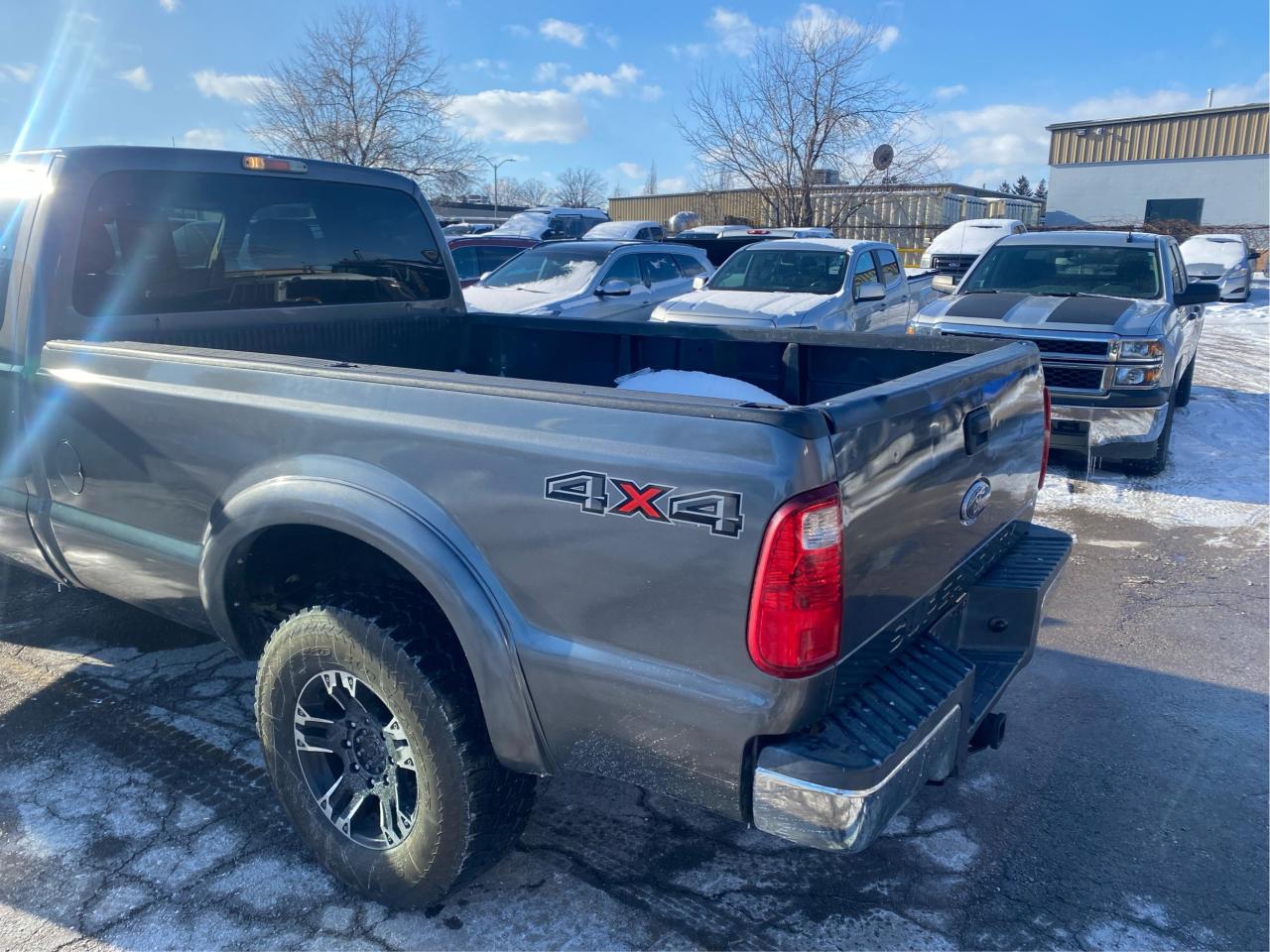 2012 Ford F-250 4WD SuperCab 158" XLT 6.2L CERTIFIED Photo