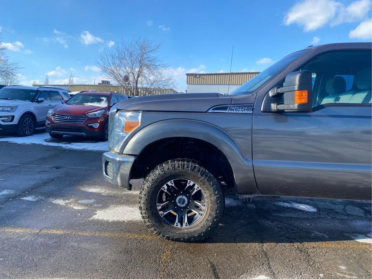 2012 Ford F-250 4WD SuperCab 158" XLT 6.2L CERTIFIED Photo