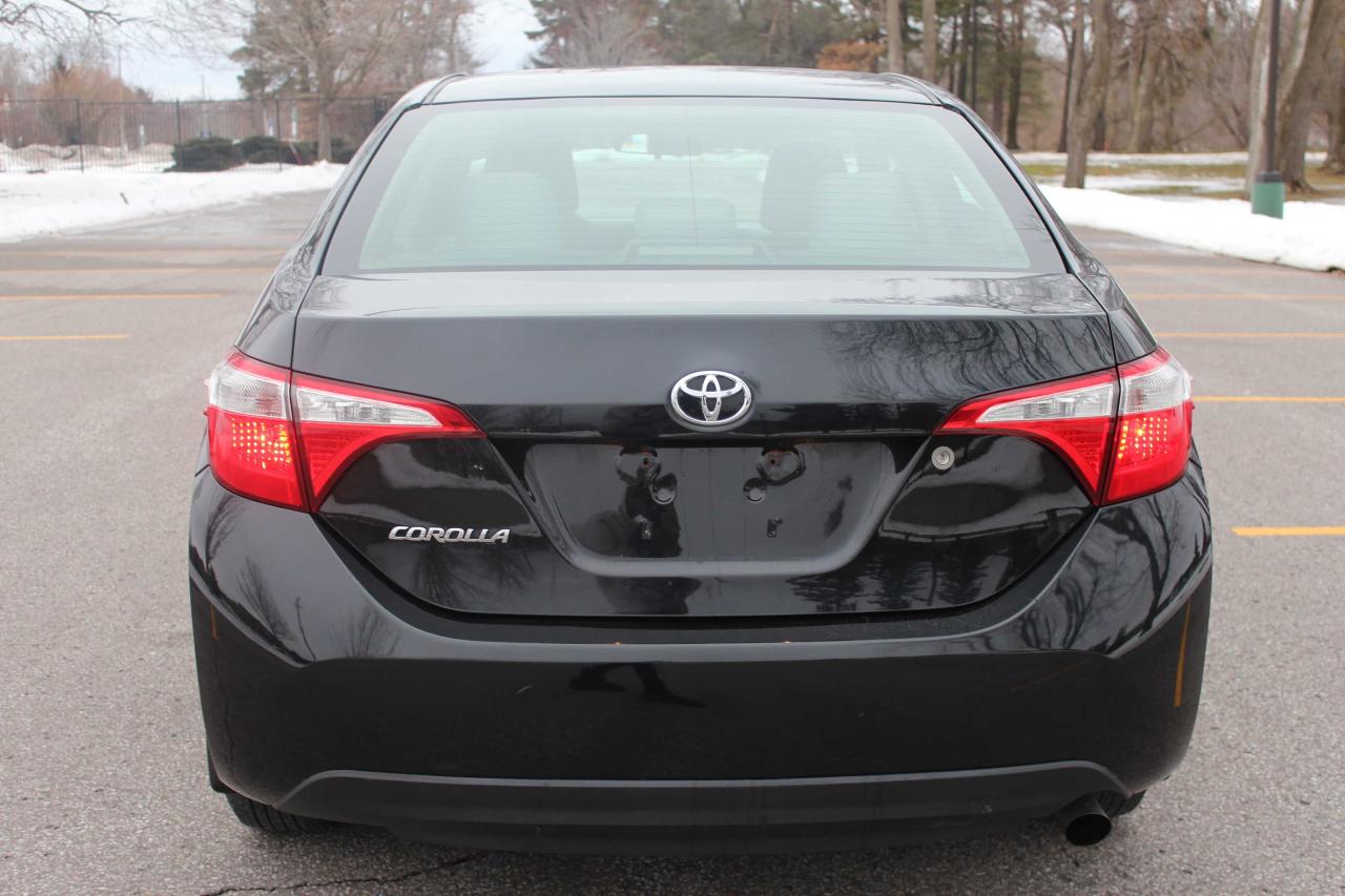 2015 Toyota Corolla 4dr Sdn Auto CE, Certified, Clean Title Photo