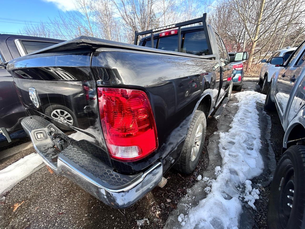 2015 RAM 1500 4WD Quad Cab 140.5 ST Photo1