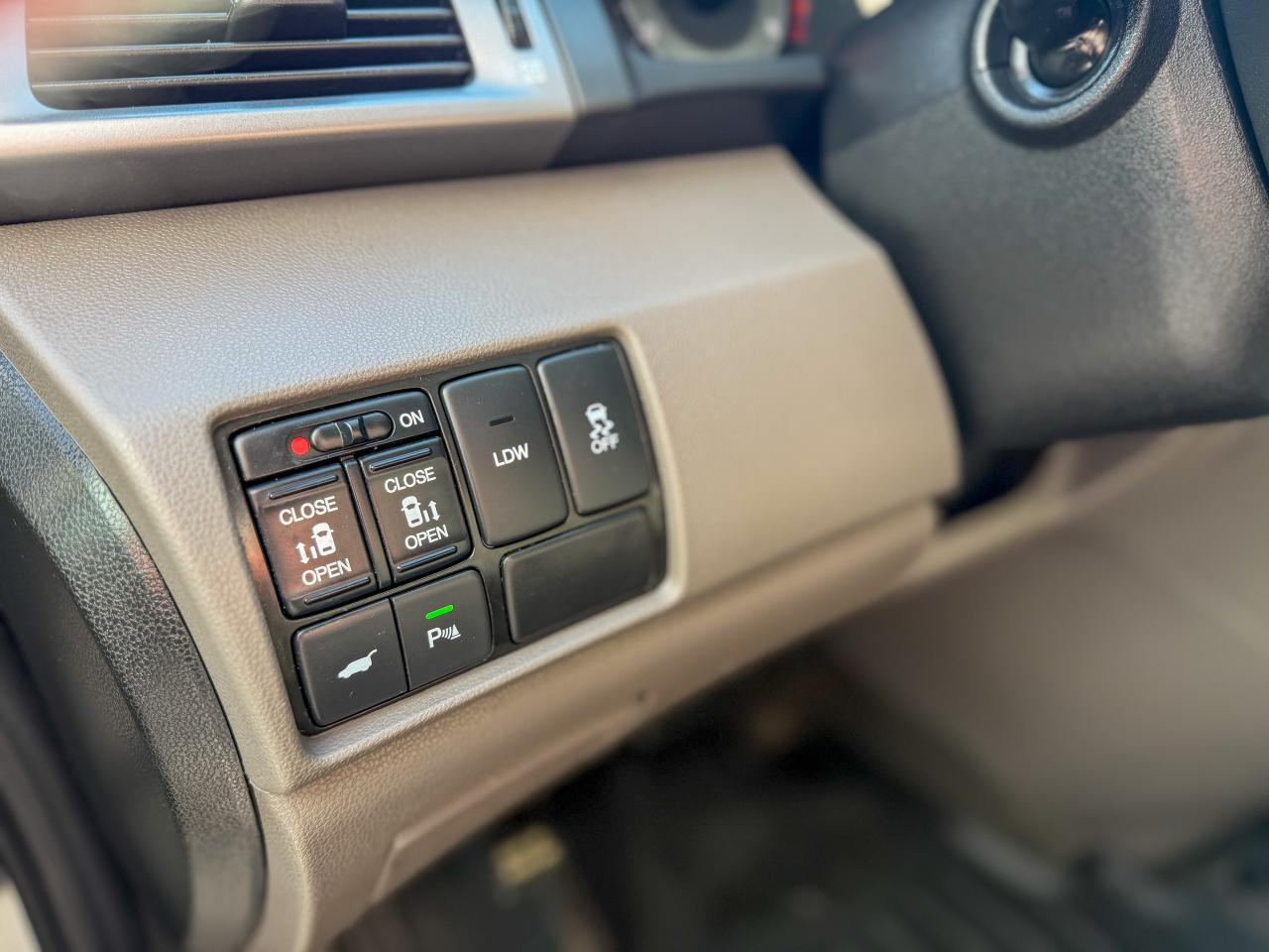 2014 Honda Odyssey EX-L/NAVI/8 PASS/P. SLIDING DOORS/LEATHER/CAMERA Photo