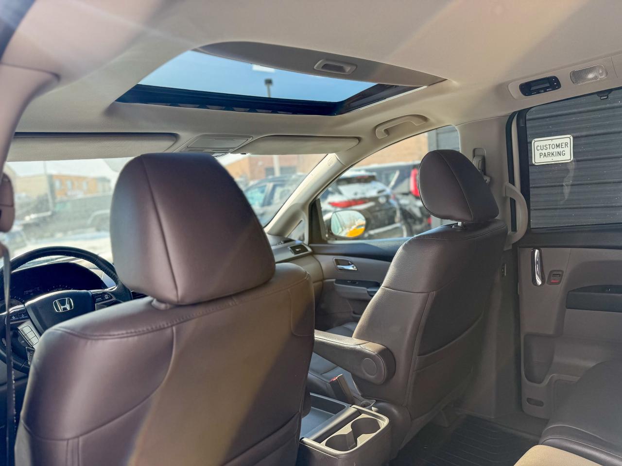 2014 Honda Odyssey EX-L/NAVI/8 PASS/P. SLIDING DOORS/LEATHER/CAMERA Photo