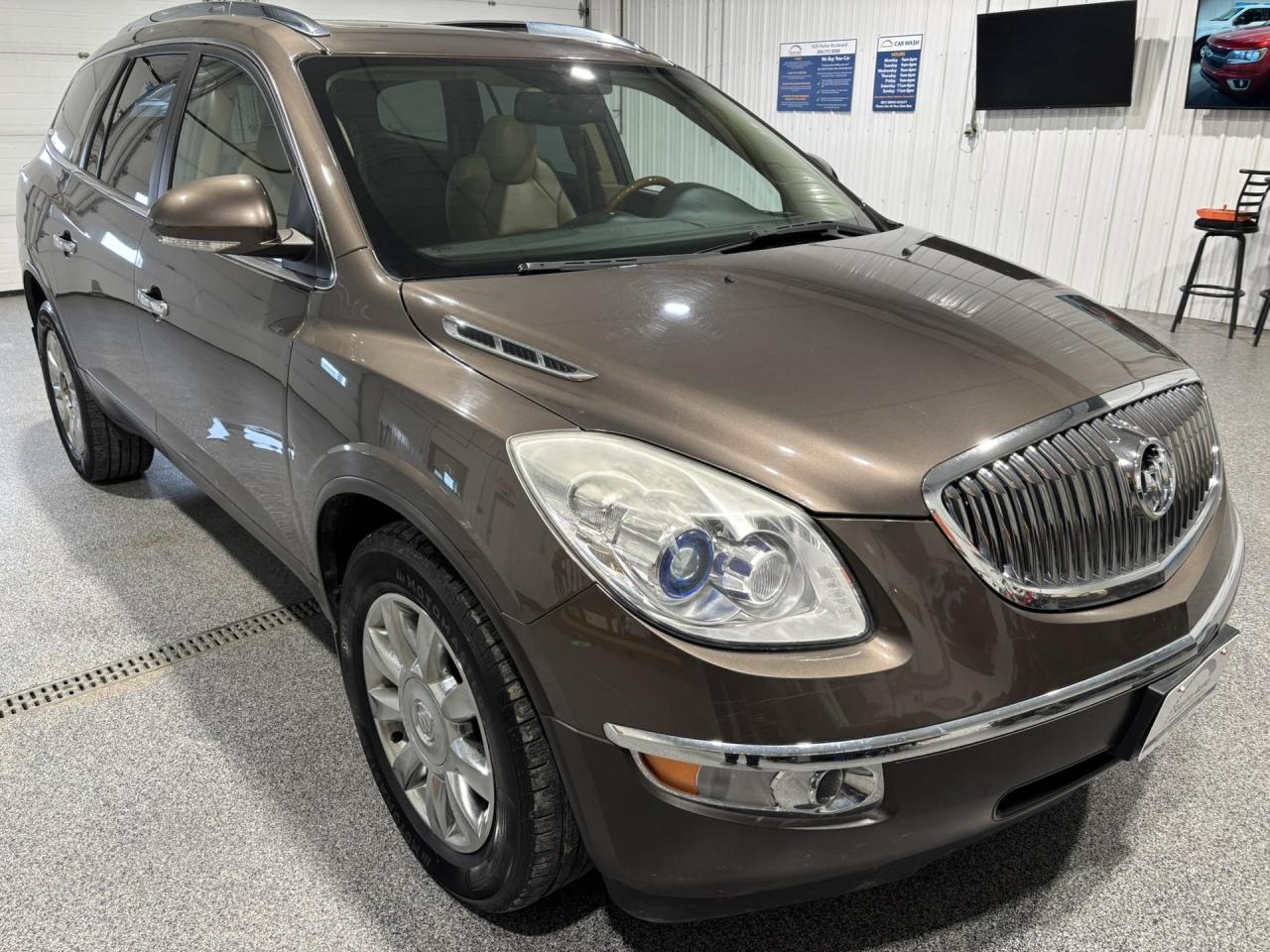 <p data-start=77 data-end=136><span data-start=77 data-end=134>Spacious Luxury Meets Confident All-Wheel Drive!</span></p><p data-start=138 data-end=516>Travel in comfort and confidence with this <span data-start=181 data-end=211>2011 Buick Enclave CXL AWD</span>! Powered by a smooth and capable <span data-start=248 data-end=266>3.6L V6 engine</span>, this midsize SUV delivers strong performance while remaining refined and comfortable for everyday driving. The <span data-start=383 data-end=409>All-Wheel Drive system</span> provides added traction and stability in all seasons, making it a great choice for Canadian roads.</p><p data-start=518 data-end=965>Step inside a spacious, upscale cabin designed with families and long trips in mind. The <span data-start=613 data-end=625>CXL trim</span> offers <span data-start=633 data-end=662>leather-appointed seating</span>, <span data-start=664 data-end=686>heated front seats</span>, <span data-start=688 data-end=735>power-adjustable driver and passenger seats</span>, <span data-start=737 data-end=775>tri-zone automatic climate control</span>, and a <span data-start=783 data-end=801>power liftgate</span> for added convenience. With <span data-start=830 data-end=855>three rows of seating</span>, theres room for everyone plus flexible cargo space for road trips, sports gear, or everyday errands.</p><p> </p><p data-start=967 data-end=1374>Safety and peace of mind come standard with features such as <span data-start=1034 data-end=1067>StabiliTrak stability control</span>, <span data-start=1069 data-end=1089>traction control</span>, <span data-start=1091 data-end=1111>anti-lock brakes</span>, <span data-start=1113 data-end=1133>rear park assist</span>, and a <span data-start=1141 data-end=1160>rearview camera</span>. Known for its smooth ride, quiet cabin, and premium feel, the <span data-start=1224 data-end=1254>2011 Buick Enclave CXL AWD</span> is a comfortable, capable SUV that checks all the boxes for families and drivers who value space and refinement.</p><p>At Sisson Auto, we make buying a vehicle a seamless and stress-free experience. Our transparent pricing eliminates haggling and eliminates any hidden fees. To give you peace of mind, we offer a 3-day/600 km No-Hassle Return Policy, a 30-day exchange privilege, minimum warranties with 24-hour roadside assistance, a check for safety recalls, and a complimentary CarFax history report. Plus, home delivery is free within 200 km. Dealer permit #5471. <o:p></o:p></p><p data-start=967 data-end=1374> </p><p>** This description was written by AI based on information provided about the vehicle. AI can sometimes produce incorrect information. Please confirm all details with the dealership.<o:p></o:p></p><p data-start=967 data-end=1374><br></p>