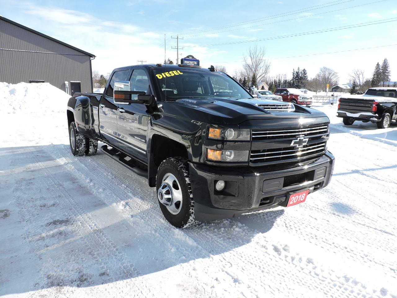 <p>A beautiful condition 2018 Silverado 3500 LT that is powered by a 6.6L Duramax turbo diesel engine and 4-whel drive. Heated seats with power adjust on both front buckets. Bluetooth, back-up camera and both front and rear park assist systems. Remote start, cordless phone charger, Bose speaker system and a CD player. Seating for 5 people in this crew cab Chevy. 5th wheel and gooseneck under bed hitch package and spray in box liner were optioned in from the factory. New front brake pads and rotors were installed for the safety. A must-see 3500 LT dually.</p><p>** WE UPDATE OUR WEBSITE REGULARLY IF YOU SEE THIS AD THE VEHICLE IS AVAILABLE! ** Pentastic Motors specializes in 4X4 Gasoline and Diesel trucks from all makes including Dodge, Ford, and General Motors. Extended warranties available! &nbsp;Financing available from 7.99% APR OAC. Delivery available to Southern Ontario Purchasers! We are 1.5 hrs from Pearson International Airport and offer free pick up from the airport to Purchasers. Leasing options available for Commercial/Agricultural/Personal! **NO ADMIN FEES! All vehicles are CERTIFIED and serviced unless otherwise stated! CARFAX AVAILABLE ON ALL VEHICLES! ** Call, email, or come in for a test drive today! 1-844-4X4-TRUX www.pentasticmotors.com</p>