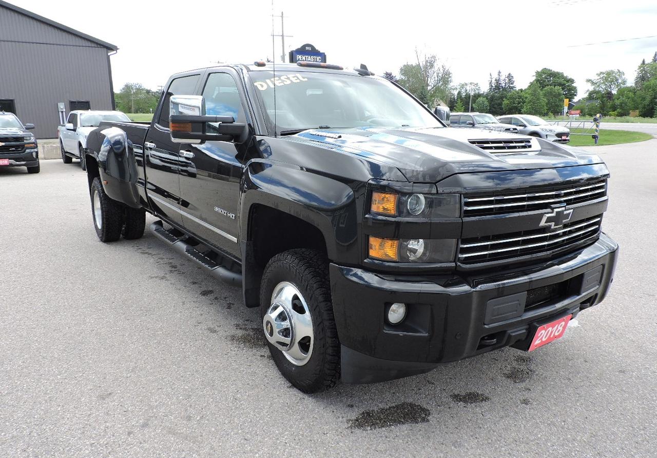 <p>A beautiful condition 2018 Silverado 3500 LT that is powered by a 6.6L Duramax turbo diesel engine, 6-speed Allison automatic transmission and 4-whel drive. Heated seats with power adjust on both front buckets. Bluetooth, back-up camera and both front and rear park assist systems. Remote start, cordless phone charger, Bose speaker system and a CD player. Seating for 5 people in this crew cab Chevy. 3:73 gear ratio in this Silverado. 5th wheel and gooseneck under bed hitch package and spray in box liner were optioned in from the factory. New front brake pads and rotors were installed for the safety. A must-see 3500 LT dually.</p><p>** WE UPDATE OUR WEBSITE REGULARLY IF YOU SEE THIS AD THE VEHICLE IS AVAILABLE! ** Pentastic Motors specializes in 4X4 Gasoline and Diesel trucks from all makes including Dodge, Ford, and General Motors. Extended warranties available! &nbsp;Financing available from 7.99% APR OAC. Delivery available to Southern Ontario Purchasers! We are 1.5 hrs from Pearson International Airport and offer free pick up from the airport to Purchasers. Leasing options available for Commercial/Agricultural/Personal! **NO ADMIN FEES! All vehicles are CERTIFIED and serviced unless otherwise stated! CARFAX AVAILABLE ON ALL VEHICLES! ** Call, email, or come in for a test drive today! 1-844-4X4-TRUX www.pentasticmotors.com</p>