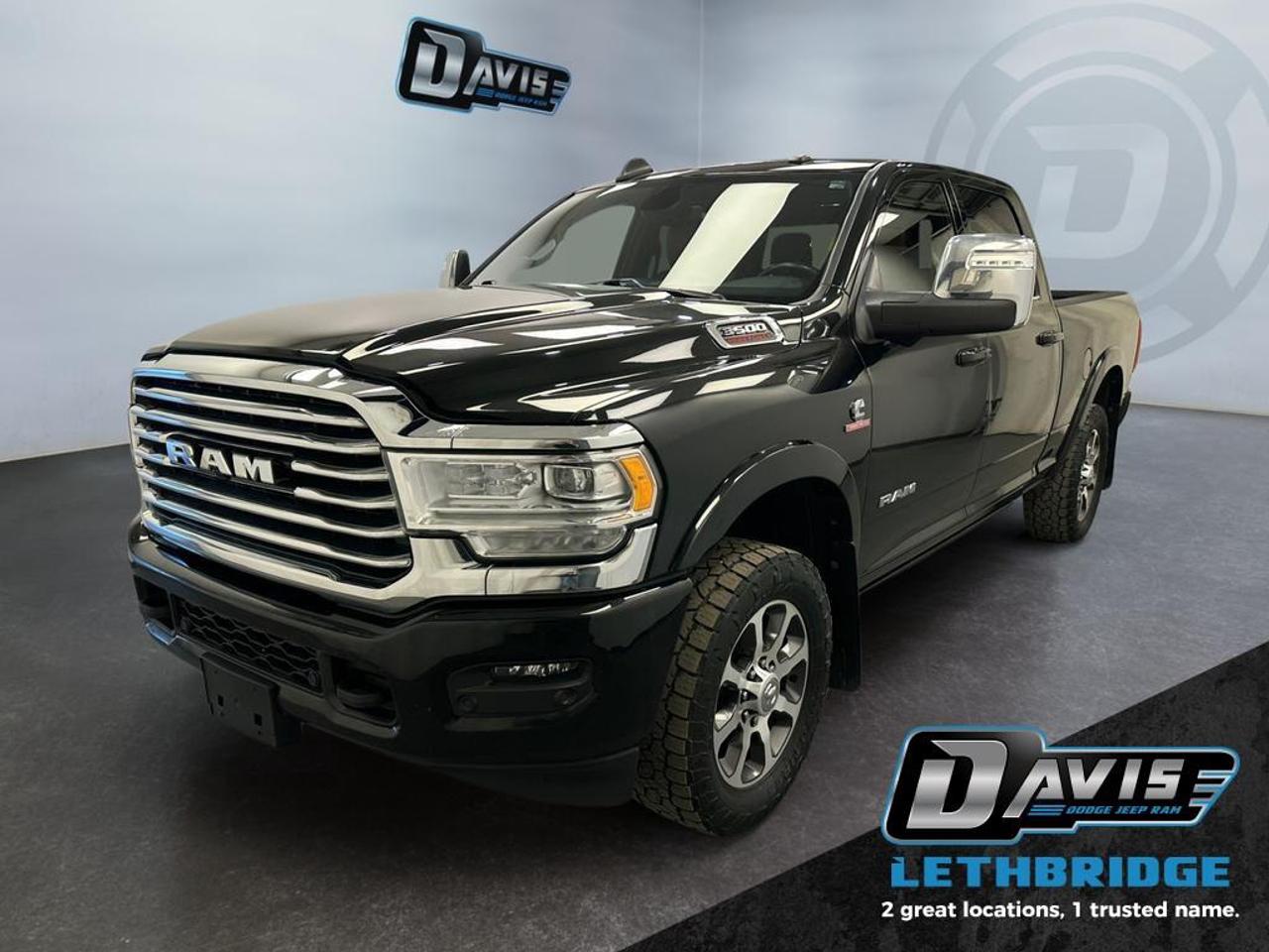 <b>Blind Spot Monitoring, CarPlay and Android Auto, Heated and Ventilated Seats</b><br /> The 2024 Ram 3500 Limited Longhorn is a premium heavy-duty diesel truck that delivers exceptional power, luxury, and capability for both work and everyday driving. Equipped with the legendary 6.7L Cummins High Output turbo diesel engine paired with a heavy-duty 6-speed automatic transmission, this Ram 3500 offers impressive towing and hauling performance. Its 4x4 system, 3.73 rear axle ratio, and advanced towing technologies make it the perfect choice for demanding jobs, while the bold Diamond Black Crystal Pearl exterior and signature Longhorn chrome accents create a commanding presence on the road.<br /><br />Inside, the Limited Longhorn stands out with a refined, upscale cabin featuring premium leather seating, real wood and aluminum trim, and distinctive Longhorn interior accents. The massive 12-inch touchscreen with Uconnect 5 navigation, Apple CarPlay, Android Auto, and a 17-speaker Harman Kardon sound system keeps you connected and entertained. Heated and ventilated front seats, heated rear seats, a heated steering wheel, dual-zone climate control, and a power sunroof ensure maximum comfort, while thoughtful details like ambient lighting and a 12-inch digital driver display elevate the driving experience.<br /><br />Built for capability and safety, this Ram 3500 is equipped with advanced features including a 360-degree surround view camera, ParkSense front and rear park assist, Blind Spot Monitoring with trailer coverage, Adaptive Steering, and Trailer Brake Control. The integrated gooseneck/5th wheel prep package, Class V hitch, trailer reverse guidance, and rear air suspension further enhance towing confidence. With its unmatched combination of heavy-duty performance, cutting-edge technology, and luxury craftsmanship, this 2024 Ram 3500 Limited Longhorn is the ultimate truck for drivers who demand it all.<br /> <br />To apply right now for financing use this link: <a href=https://lethbridge.davisdodge.ca/free-credit-check/ target=_blank rel=nofollow noopener noreferrer>https://lethbridge.davisdodge.ca/free-credit-check/</a><br /><br /> <br /><br />Locally Owned & Trusted for Over 35 Years  Davis Dodge in Lethbridge, AB <br /><br /> At Davis Dodge, weve proudly served the Lethbridge community for more than 35 years, offering an unparalleled car buying experience. Dont just take our word for itour Google reviews speak volumes about our commitment to exceptional service. <br /><br /> Delivery & At-Home Test Drives: Convenient options to suit your lifestyle. <br /><br /> Flexible Financing for Everyone: Get the vehicle you need with financing solutions tailored to your situation. <br /><br /> Full Mechanical Inspections & Professional Cleaning: Every vehicle is thoroughly inspected and cleaned before it hits our lot.<br /><br /> We take all makes and models on trade and offer competitive pricing with inventory that changes daily. Whether you're shopping for a Chrysler, Dodge, Jeep, RAM, or FIAT, our AMVIC Licensed dealership makes it easy to browse, buy, and drive away.<br /><br /> Located in Lethbridge, AB, we proudly serve customers in Fort Macleod, Taber, Claresholm, and Coaldale. Shop online or visit us today to experience the best in sales, service, and selection. Standard bank rates apply; taxes are additional.<br /><br /> Vehicle pricing offer shown expires 2026-04-30. <br /> Come by and check out our fleet of 80+ used cars and trucks and 110+ new cars and trucks for sale in Lethbridge. o~o