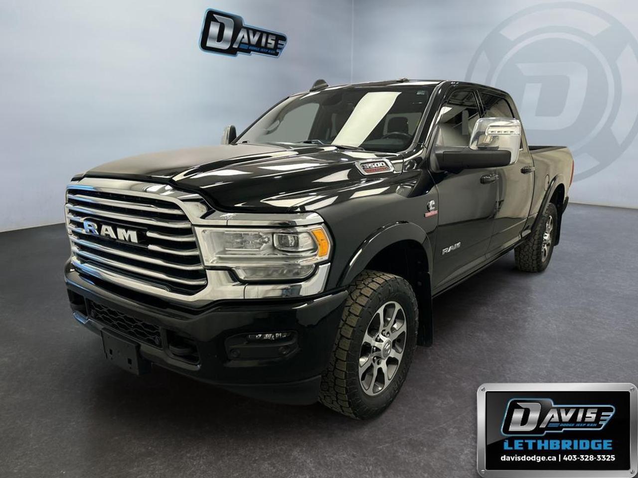 <p><strong>2024 Ram 3500 Limited Longhorn - Black 4×4 Performance</strong></p><p>Designed for uncompromising off-road and on-road performance, this 2024 Ram 3500 Limited Longhorn combines a commanding presence with 4×4 agility in a striking black finish. Equipped with an automatic transmission, it's the perfect companion for any journey.</p><p><strong>Interior Features</strong></p><ul><li>Luxurious black leather seats for a premium experience</li><li>Connectivity at your fingertips with a smart device integration</li><li>Ultimate comfort with heated and cooled front seats</li><li>Advanced navigation system for stress-free drives</li><li>Convenience with power seats and windows</li><li>Sophisticated sound experience with 17 Speaker Harman/Kardon audio system</li></ul><p><strong>Exterior Features</strong></p><ul><li>Stylish alloy wheels for enhanced aesthetics</li><li>Convenient running boards for ease of access</li><li>Rugged black finish that commands attention</li><li>Convenient remote start capability</li><li>Engine: 6.7L Cummins I-6 HO Turbo Diesel for superior performance</li><li>Practical backup camera and parking sensors for your peace of mind</li></ul><p><strong>Technology & Safety Features</strong></p><ul><li>360 Camera for comprehensive visibility and safety</li><li>Wi-fi hotspot to keep you connected on the go</li><li>Enhanced Brake Assist for crucial stopping power</li><li>Selective Catalytic Reduction (Urea) to meet emissions standards</li><li>Advanced driver assistance with heated mirrors and steering wheel</li></ul><p>Whether you're a contractor needing a reliable workmate or an adventure enthusiast looking for a powerful ride, this Ram 3500 Limited Longhorn caters to all your needs. Contact Davis Dodge Lethbridge today to schedule a test drive and experience this remarkable truck firsthand.</p>