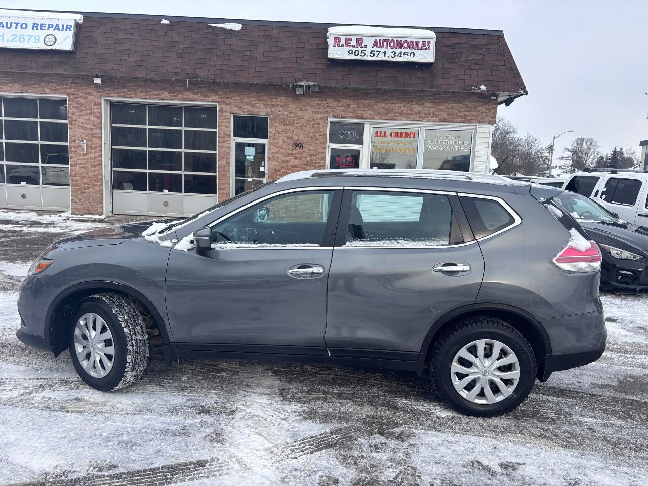 <p>Looking for a reliable and versatile SUV that can handle Canadas diverse driving conditions? Check out this exceptionally clean 2015 Nissan Rogue AWD, available now at R.E.R. Automobiles Ltd. This stylish crossover, painted in a sleek grey exterior with a comfortable black interior, offers both practicality and a touch of sophistication. With its efficient 4-cylinder engine and smooth variable transmission, this Rogue is ready for your daily commute or weekend adventures. Plus, it has the added confidence of all-wheel drive, making it a great choice for tackling those snowy Canadian winters. This particular model has 171,790km on the odometer.</p><p>This 2015 Nissan Rogue AWD at R.E.R. Automobiles Ltd. is not just about looks and practicality; its packed with features designed to enhance your driving experience.</p><p>Here are five features youll love:</p><ul><li><strong>All-Wheel Drive:</strong> Provides superior traction and control in various road conditions.</li><li><strong>Variable/CVT Transmission:</strong> Offers smooth, efficient shifting for a comfortable ride.</li><li><strong>Spacious Interior:</strong> Plenty of room for passengers and cargo.</li><li><strong>Fuel-Efficient Engine:</strong> Saves you money at the pump.</li><li><strong>Extra Clean Condition:</strong> This Rogue has been well-maintained and is ready to impress.</li></ul><p><strong><em>Powered by AutoIntelligence&trade;</em></strong> Vehicle information has been generated using artificial intelligence and is provided for informational purposes only. While efforts are made to ensure accuracy, please confirm all details directly with the dealer.</p><pre style=overflow-wrap: break-word; white-space: pre-wrap;>This vehicle is certified,  serviced & oil changed. Financing available O.A.C  <br><br><br>R.E.R. Automobiles Ltd. is a family owned business, established in 1994.<br><br>Referrals built us, reliability keep us serving you.<br><br>R.E.R. Automobiles Ltd. ... We Care.</pre><p>&nbsp;</p>