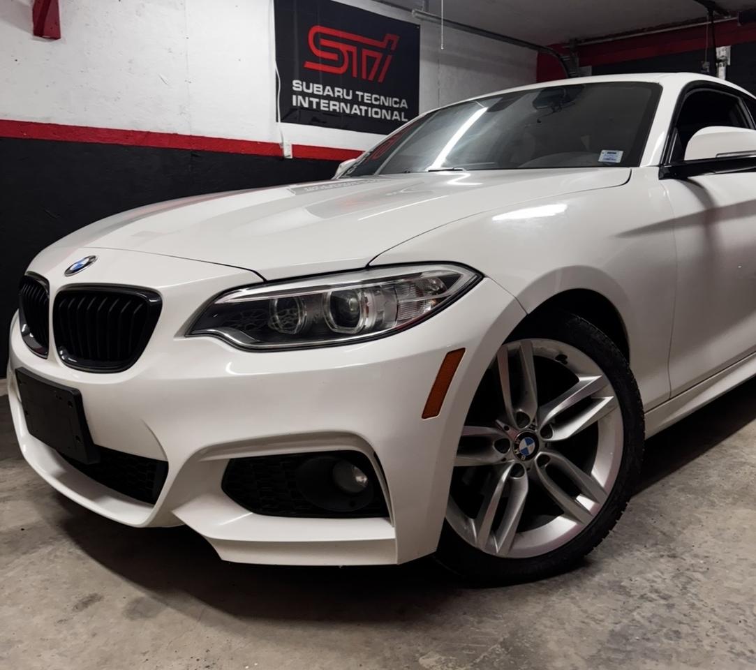 <p>Wow! At Jinshu we have an extremely well kept 2017 Bmw 230i Xdrive M package with a clean Carfax and low Km.</p><p>This car looks the part, is fully loaded and has very well done modifications. This vehicle was previously owned by a Bmw technician. This Bmw drives like an all wheel drive tank with plenty of power, great gas milage and all the comforts you could need. The engine inside this Bmw is The B48, 2.0 turbocharged 4 cylinder known for its reliabilty and ability to maker power with simple mods.&nbsp;</p><p>&nbsp;</p><p>Vehicle information Below!!!</p><p class=p1>&nbsp;-Keyless entry&nbsp;</p><p class=p1>-Power Windows&nbsp;</p><p class=p1>-Bluetooth (hands free calling)&nbsp;</p><p class=p1>-Power mirrors</p><p class=p1>-Power Locks&nbsp;</p><p class=p1>-Cruise control&nbsp;</p><p class=p1>- Air conditioning&nbsp;</p><p class=p1>-Automatic transmission</p><p class=p1>- Beautiful upgraded rear diffuser and Blacked out front grills.&nbsp;</p><p class=p1>- Premium sound system&nbsp;</p><p class=p1>- Xdrive AWD</p><p class=p1>-Like new Michelin winter Tires</p><p class=p1>-AWE Catback exhaust ( Sounds amazing , stock part included)</p><p class=p1>- Beautiful Double spoke BMW M 17 inch&nbsp; alloy wheels&nbsp;</p><p class=p1>-Reverse Camera</p><p class=p1>&nbsp;-High kick carbon fiber trunk spoiler&nbsp;</p><p class=p1>&nbsp;-Heated Seats&nbsp; / Heated steering wheel&nbsp; &nbsp; &nbsp;</p><p class=p1>- Full M- Line interior package&nbsp;</p><p>And Much more..........</p><p>All of our Vehicles come with a 6 month / 6000km Powertrain warranty. Extended warranty packages are also available. At Jinshu, we hand select the cleanest vehicles possible and we back the mechanical condition with a free 6 month warranty. Financing is&nbsp; available on this vehicle.&nbsp; Please note, we do not charge any unnecessary fees when Purchasing outright.&nbsp;</p><p>Every Car we list, we tell the story:</p><p>&nbsp;</p><p>This 2017 BMW 230i xDrive M Sport is proof that small, light, and boosted is the right recipe. BMW&rsquo;s driver-first DNA is all over this coupe, but the tasteful mods take it up a notch &mdash; AWE cutback exhaust for that perfect turbo growl, aggressive diffuser, subtle lip spoiler, and blacked-out kidney grilles to finish the look. With xDrive keeping it hooked up and the M Sport package sharpening everything from the stance to the feel, this 230i turns every back road, on-ramp, and late-night cruise into a good decision. Built for drivers who want their daily to feel like a weekend car.</p><p>Thanks For viewing this beautiful BMW .......</p>