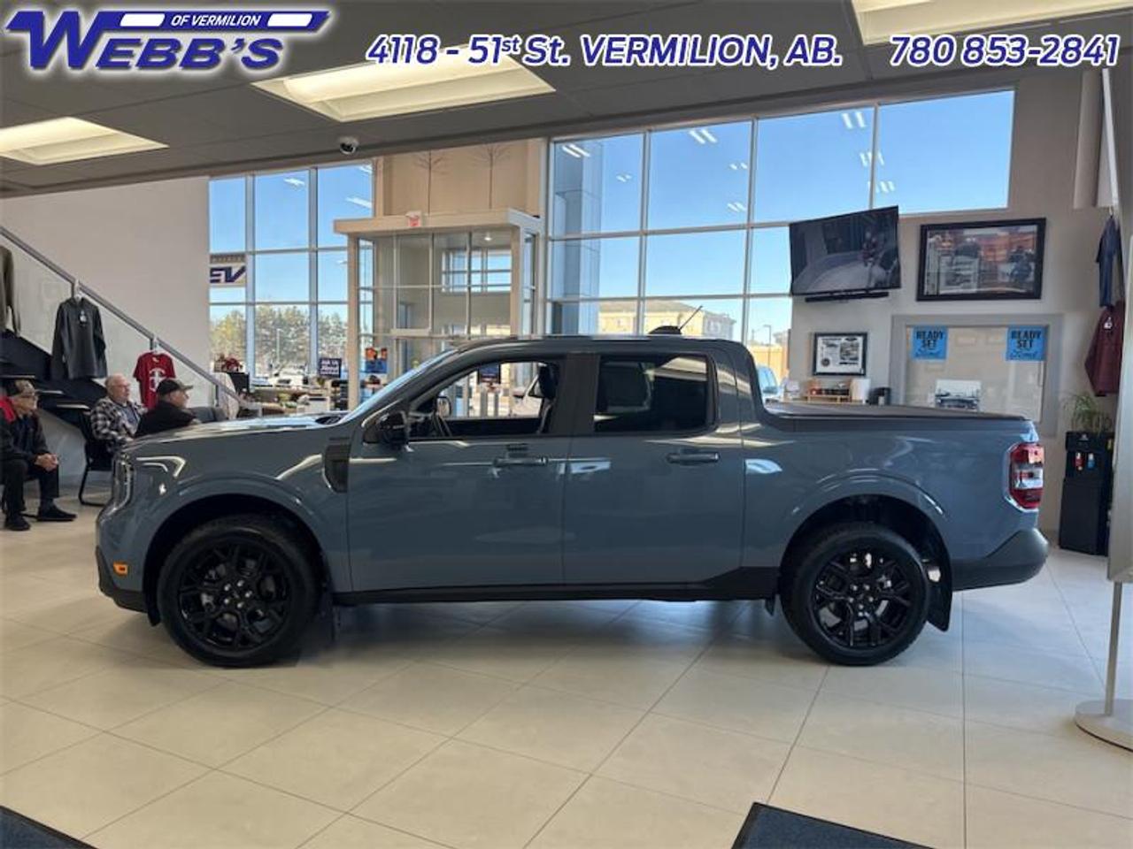 <b>502A Equipment Group, Heated Seats, Tow Package, Black Appearance Package!</b><br> <br> <br> <br>The 2026 Ford Maverick delivers compact utility, bold styling and versatile capability in a pickup built for modern life. <br> <br>The 2026 Ford Maverick balances the utility of a pickup with the size and maneuverability tailored for daily use and light-duty tasks. Inside, the cabin features thoughtful materials, simple modern tech and seating designed to support every passenger comfortably. With its versatile footprint, confident styling and Fords reputation for dependability, the Maverick stands out as a smart choice for lifestyle-driven truck buyers.<br> <br>This Azure Grey Met Tri-coat Crew Cab 4X4 pickup has a CVT transmission and is powered by a 250HP 2.0L 4 Cylinder Engine. <br>This vehicles price also includes $2981 in additional equipment, specifically: <b>hd mudflaps hard fold box cover tailgate lettering door scuff plates</b>. <br> <br> Our Mavericks trim level is Lariat. This advanced hybrid pickup truck blends capability, efficiency, and premium technology, offering all-wheel drive, Class I towing with trailer sway control, spray-in bed liner, integrated storage, and a 1,500 lb maximum payload for confident hauling and utility. Inside, ActiveX heated front bucket seats with power lumbar, a heated leatherette steering wheel, voice-activated dual-zone automatic climate control, and a 13.2 SYNC 4 display with B&O sound, wireless Apple CarPlay/Android Auto, SiriusXM Traffic, connected navigation, 5G Wi-Fi hotspot, and keyfob remote start create a connected and comfortable cabin. Safety is exceptional with Ford Co-Pilot360 technologies including blind-spot assist, lane centering and lane-keeping aid, adaptive cruise with stop-and-go, aerial view and multiple cameras, reverse brake assist, pre-collision assist with automatic emergency braking and intersection support, front cross-traffic mitigation, front/rear parking sensors, Safety Canopy airbags, and electronic stability control with roll stability management. This vehicle has been upgraded with the following features: 502A Equipment Group, Heated Seats, Tow Package, Black Appearance Package.<br><br> View the original window sticker for this vehicle with this url <b><a href=http://www.windowsticker.forddirect.com/windowsticker.pdf?vin=3FTTW8SA2TRA09237 target=_blank>http://www.windowsticker.forddirect.com/windowsticker.pdf?vin=3FTTW8SA2TRA09237</a></b>.<br> <br>To apply right now for financing use this link: <a href=https://www.webbsford.com/financing/ target=_blank>https://www.webbsford.com/financing/</a><br><br> <br/>    4.99% financing for 84 months. <br> Buy this vehicle now for the lowest bi-weekly payment of <b>$373.31</b> with $0 down for 84 months @ 4.99% APR O.A.C. ( taxes included, $199 documentation fee   / Total cost of borrowing $10643   ).  Incentives expire 2026-04-30.  See dealer for details. <br> <br>Webbs Ford is located at 4118 - 51st Street in beautiful Vermilion, AB. <br/>We offer superior sales and service for our valued customers and are committed to serving our friends and clients with the best services possible. If you are looking to set up a test drive in one of our new Fords or looking to inquire about financing options, please call (780) 853-2841 and speak to one of our professional staff members today.   Vehicle pricing offer shown expires 2026-04-30.  o~o