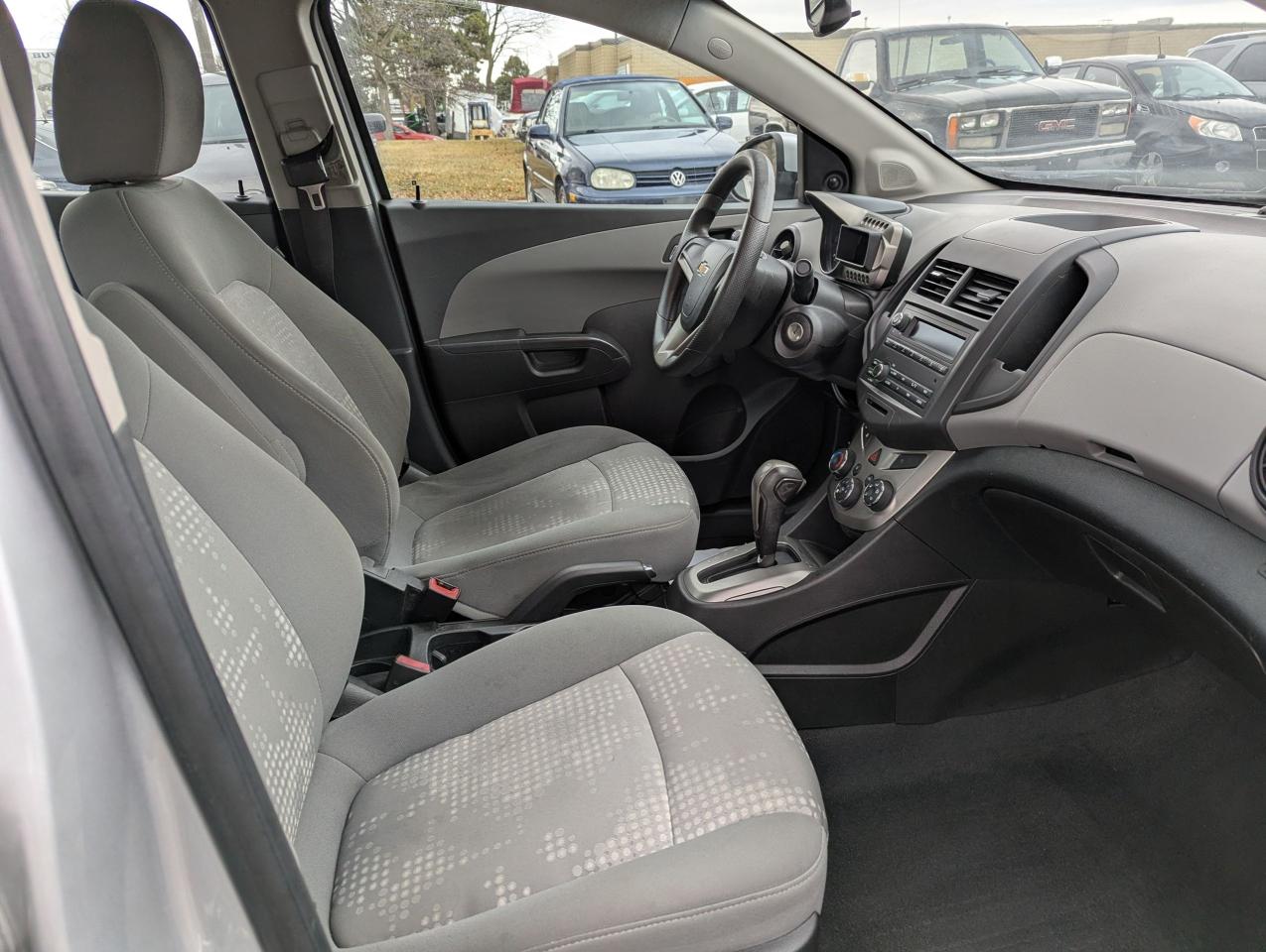 2012 Chevrolet Sonic "Gas MISER" certified + FREE 6M warranty Photo