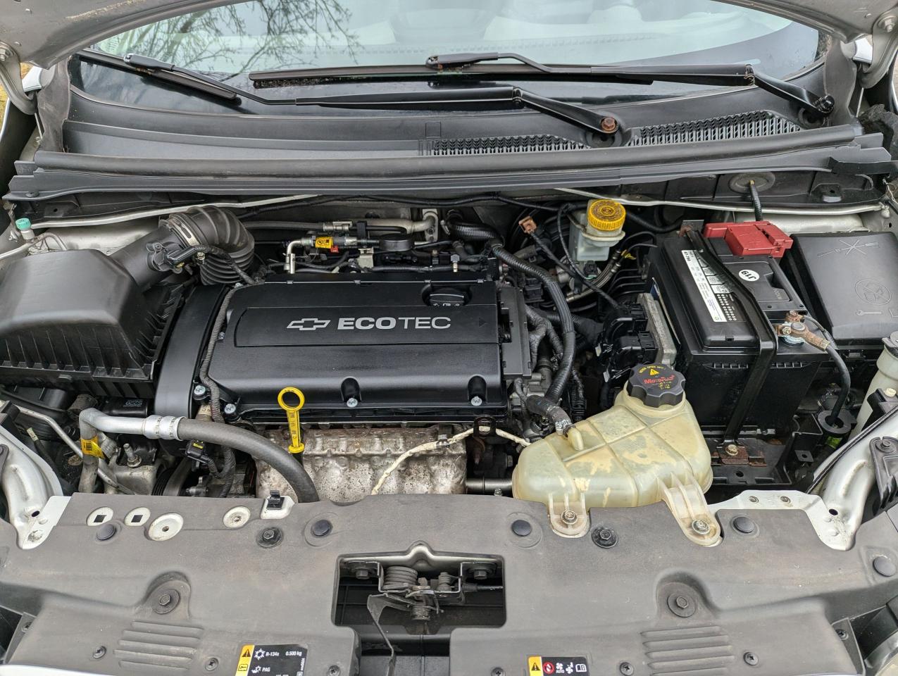 2012 Chevrolet Sonic "Gas MISER" certified + FREE 6M warranty Photo