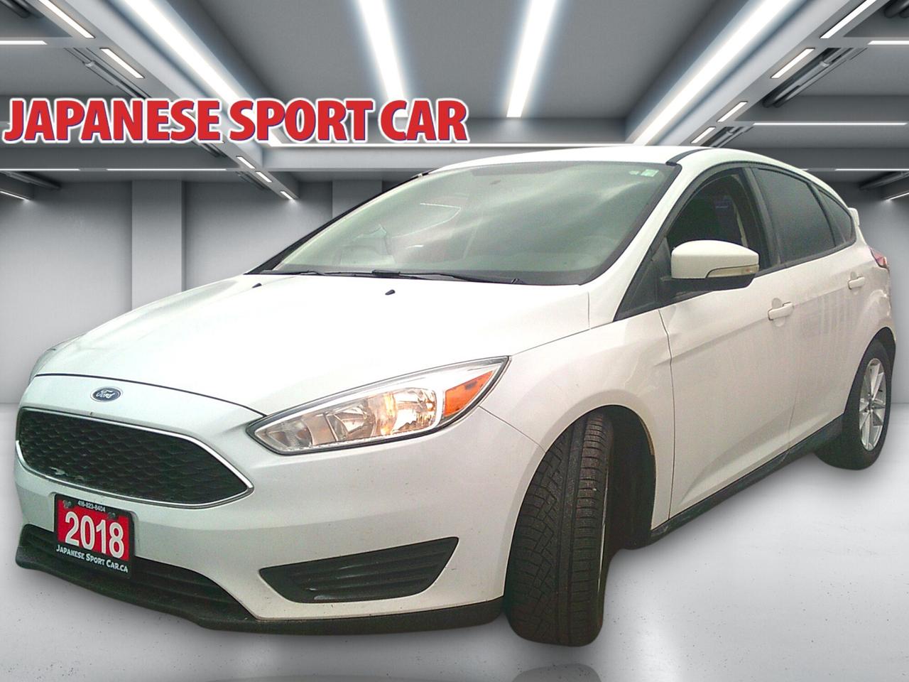 ONLY 1 Previous Owner! Safety & Warranty. Trades are welcome. Need financing? No problem, we deal with many financial companies that can help buyers finance the vehicle they want! Any credit welcome. Japanese Sport Car has been serving Canadians for over 25 years, and we strive to provide the best service possible to customers all over Canada! We now offer FREE vehicle delivery anywhere in the Niagara Region! Buy Ahead And Pickup From Our Location Or Have It Shipped Directly To Your Door! Ask Us Today! BUY WITH CONFIDENCE! OMVIC & UCDA Registered dealer, specializing in Commercial Trucks for over 25 years!

2018 Ford Focus SE
Body Type Hatchback
Mileage 203XXX km
Transmission Automatic
Engine 2L 4cyl
Drive Type Front Wheel Drive
Fuel Type Gasoline
Ext/Int Colour White/Black
# of Passengers 5
Interior Cloth

Features
A/C
Power Locks
Power Windows
Tilt Steering
Heated Seats (Front)
Heated Steering Wheel
Compass
Outside Temp
Rear View Camera
Keyless Entry
AM/FM Stereo
ABS

We offer a comprehensive Client Care Package for only $799 which includes a certified safety inspection and a 2-year Silver Powertrain Warranty with UNLIMITED kilometers giving you confidence and coverage from day one. All prices do not include certification, applicable taxes (HST) and licensing fees. Without certification, as per OMVIC regulations, the vehicle is not road worthy, not E-tested, nor certified.