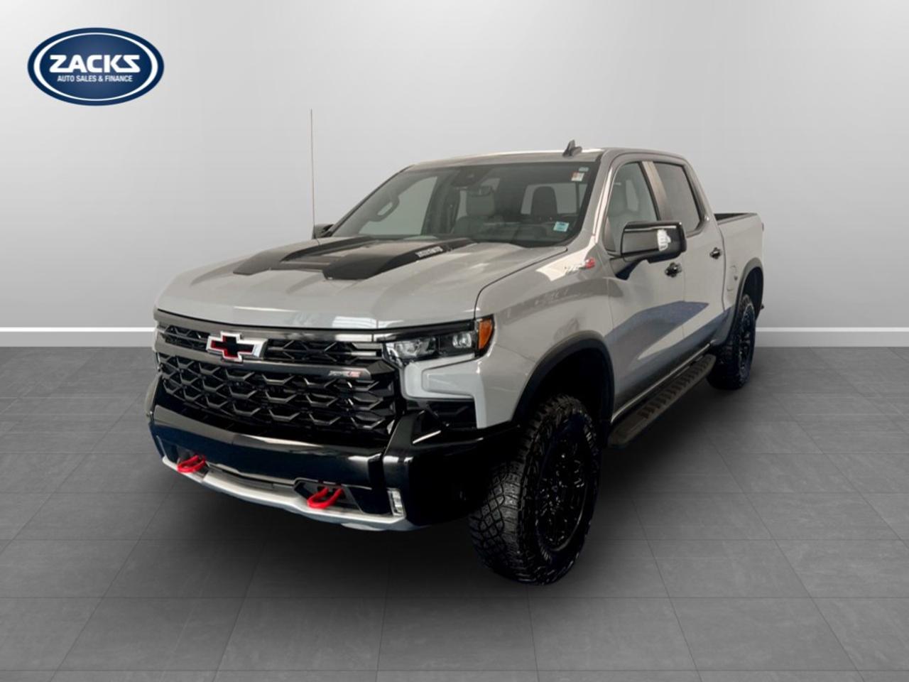 New Price! 2024 Chevrolet Silverado 1500 ZR2 Crew Cab ZR2 | Duramax | Low Kms | One Owner | Zac Certified. 10-Speed Automatic 4WD Sterling Gray Metallic 3.0L I6<br />Odometer is 8628 kilometers below market average!<br /><br />10-Speed Automatic, 4WD, Gideon/Very Dark Atmosphere w/Perforated Leather-Appointed Front Seat Trim, 10-Way Power Driver Seat w/Lumbar, 10-Way Power Passenger Seat Adjuster w/Lumbar, 12.3''' Multicolour Reconfigurable Digital Display, 120-Volt Bed Mounted Power Outlet, 120-Volt Interior Power Outlet, 2 USB Data Ports, 2nd Row Heated Outboard Seats, 3 Years of OnStar & Connected Services Plan, 6''' Rectangular Black Tubular Assist Steps (LPO), Air Conditioning, All-Weather Floor Liner (LPO), Apple CarPlay/Android Auto, Auto-dimming door mirrors, Auto-Dimming Inside Rear-View Mirror, Automatic temperature control, Bed View Camera, Bluetooth® For Phone, Chevrolet Connected Access Capable, Chevytec Spray-On Black Bedliner, Colour-Keyed Carpeting Floor Covering, Deep-Tinted Glass, Driver Memory, Dual Exhaust, Dual Rear USB Ports (Charge Only), Electric Rear-Window Defogger, Electrical Steering Column Lock, Electronic Cruise Control, EZ Lift Power Lock & Release Tailgate, Floor Mounted Centre Console, Forward Collision Alert, Front fog lights, Front LED Fog Lamps, Front Rainsensing Wipers, Fully automatic headlights, HD Surround Vision, Heated Driver & Front Outboard Passenger Seats, Heated front seats, Heated rear seats, Heated Steering Wheel, Heated steering wheel, Heavy-Duty Air Filter, High Gloss Black Mirror Caps, Hill Descent Control, Hitch Guidance, Hitch Guidance w/Hitch View, In-Vehicle Trailering System App, Integrated Trailer Brake Controller, Keyless Open & Start, Lane Keep Assist w/Lane Departure Warning, LED Cargo Area Lighting, Manual Tilt/Telescoping Steering Column, OnStar & Chevrolet Connected Services Capable, Outside Heated Power-Adjustable Mirrors, Perforated Leather Seat Trim, Performance Red Recovery Hooks, Perimeter Lighting, Power driver seat, Power Front Passenger Windows w/Express Up/Down, Power Front Windows w/Driver Express Up/Down, Power Rear Windows w/Express Down, Power Sliding Rear Window w/Rear Defogger, Power windows, Preferred Equipment Group 3LT, Premium Bose 7-Speaker Sound System, Radio: Chevrolet Infotainment 3 Premium System, Rain sensing wipers, Rear Cross Traffic Braking, Rear Park Assist, Rear Pedestrian Alert, Rear Wheelhouse Liners, Remote keyless entry, Remote Vehicle Starter System, Safety Alert Seat, SiriusXM w/360L, Standard Tailgate, Steering Wheel Audio Controls, Theft Deterrent System (Unauthorized Entry), Tilt steering wheel, Trailer Camera Provisions, Trailer Side Blind Zone Alert, Trailering Package, Universal Home Remote, Up-Level Rear Seat w/Storage Package, Ventilated Driver & Front Passenger Seats, Ventilated front seats, Wheels: 18''' x 8.5''' Gloss Black, Wi-Fi Hot Spot Capable, Wrapped Steering Wheel, ZR2 Suspension Package.<br /><br />Certification Program Details: Fresh 2 Yr MVI | 30 day warranty* | 110 point inspection | Full tank of fuel | Krown rustproofed | Flexible financing options | Professionally detailed<br /><br />This vehicle is Zacks Certified! You're approved! We work with you. Together we'll find a solution that makes sense for your individual situation. Please visit us or call 902 843-3900 to learn about our great selection.<br /><br />With 22 lenders available Zack's Auto Sales can offer our customers with the lowest available interest rate. Thank you for taking the time to check out our selection!
