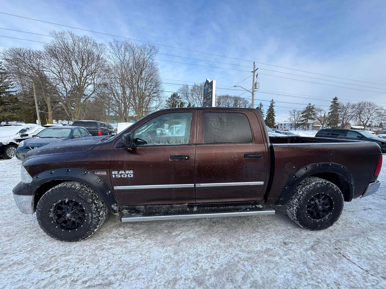 2014 RAM 1500 4WD Crew Cab 140.5" ST Photo3