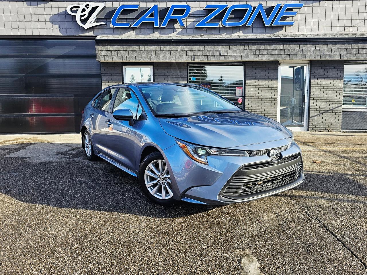 <p>Cruise around town in style and efficiency with this pristine 2024 Toyota Corolla LE CVT, now available at Car Zone! This sleek sedan, boasting a vibrant blue exterior and a refined black interior, is ready to elevate your daily commute. With only 66,705km on the odometer, this Corolla offers exceptional value and is poised to provide years of reliable service. Its fuel-efficient 2L I4 engine and smooth CVT transmission make every drive a pleasure, while its practical sedan design offers ample space for both passengers and cargo.</p><p>This Corolla LE CVT is more than just a car; its a statement. It embodies Toyotas legendary reliability and is packed with features designed to enhance your driving experience. The Corollas front-wheel-drive offers excellent handling and control. Experience the perfect blend of comfort, practicality, and efficiency with this fantastic vehicle from Car Zone.</p><p>Here are some features of this 2024 Toyota Corolla LE 2.0L :</p><ul><li><strong>Fuel Sipping Efficiency:</strong> Save money at the pump with its impressive fuel economy.</li><li><strong>Smooth CVT Transmission:</strong> Enjoy seamless acceleration and a refined driving experience.</li><li><strong>Toyota Reliability:</strong> Drive with confidence knowing its built to last.</li><li><strong>Modern Design:</strong> Turn heads with its stylish exterior.</li><li><strong>Spacious Interior:</strong> Comfortable seating for passengers and ample cargo space.</li></ul><p>Looking for Your Dream Car? Call Car Zone Today!</p><p>Thanks for viewing our Car Zone inventory. All of our vehicles come fully detailed with a Carfax and a mechanical fitness assessment. Drive this home today! Easy financing options. All credit welcome.&nbsp;<strong><a href=http://www.calgary.ca/finance>APPLY NOW</a>&nbsp;</strong>We even take trades. Same day approvals at&nbsp;<a href=http://www.carzonecalgary.ca/><strong>CARZONECALGARY</strong></a> or visit us in person at 2036 36 Street SE Calgary for a hassle free test drive. Let our friendly team of experts book an appointment with you and show you the Car Zone difference! AMVIC licensed dealer.&nbsp;</p>