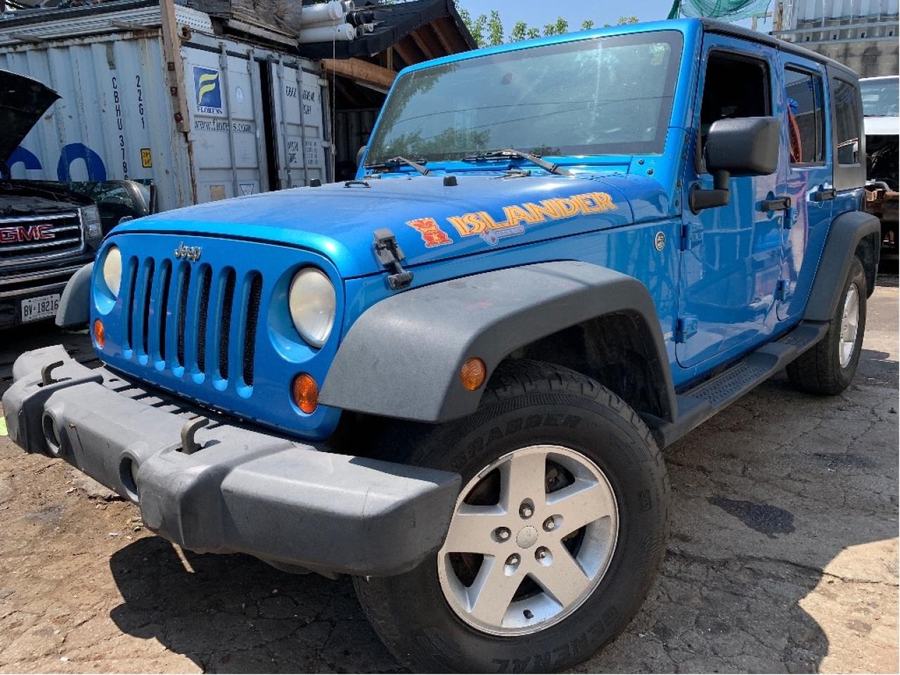 2010 Jeep WRANGLER UNLIMITED 4WD 4dr Islander 6 SPEED TRANS Photo