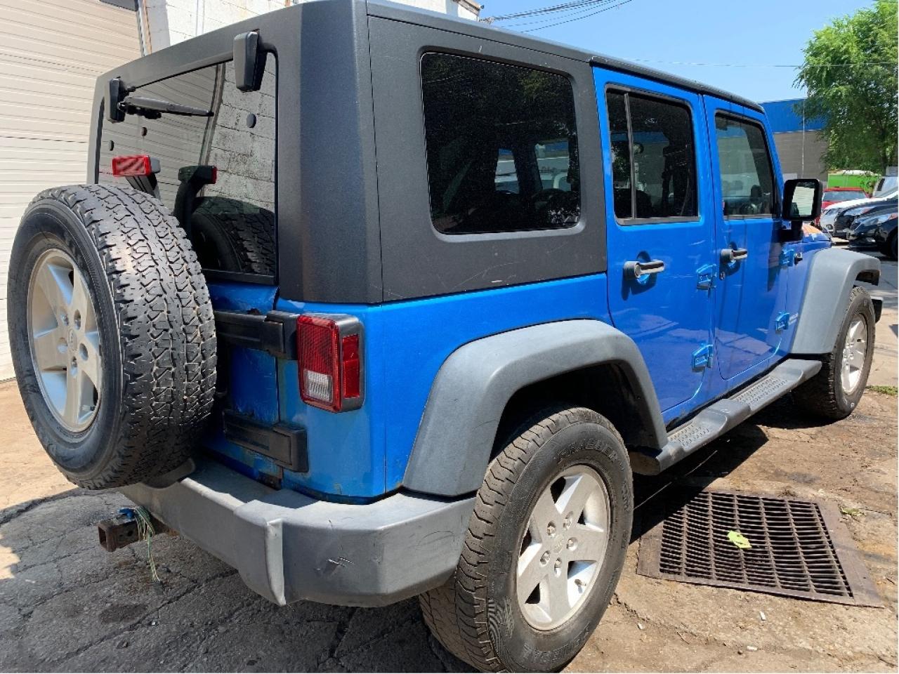 2010 Jeep WRANGLER UNLIMITED 4WD 4dr Islander 6 SPEED TRANS Photo