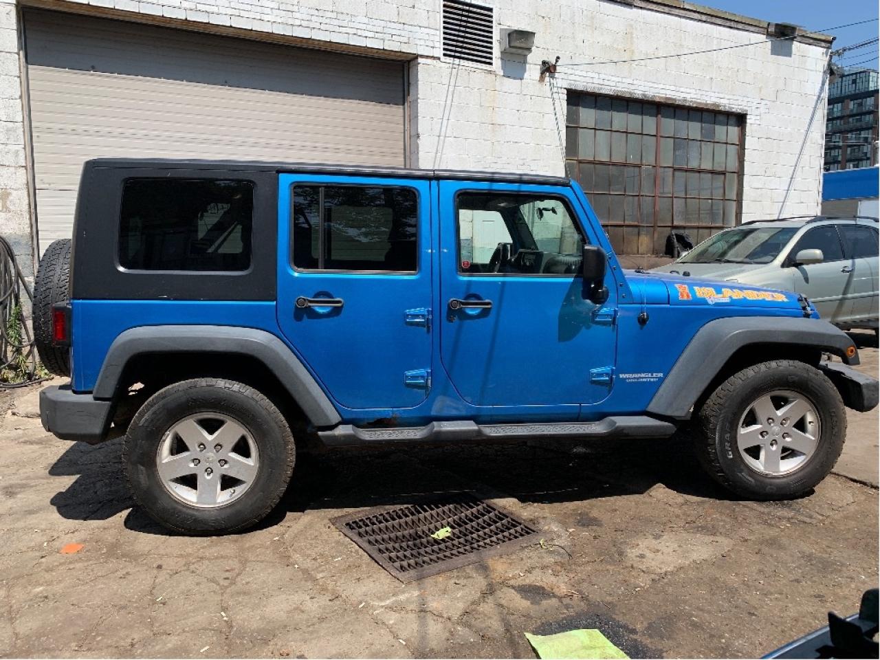 2010 Jeep WRANGLER UNLIMITED 4WD 4dr Islander 6 SPEED TRANS Photo