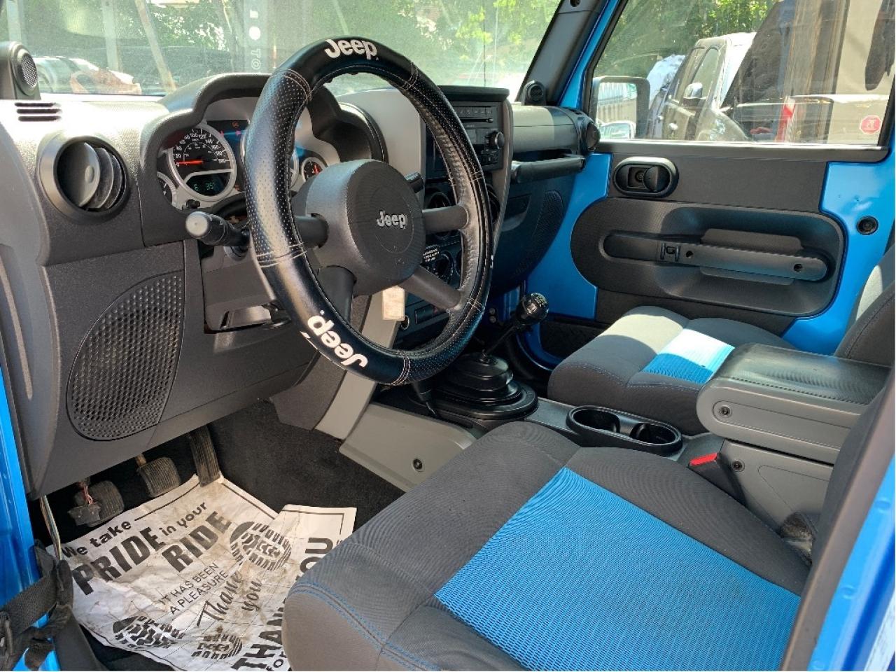 2010 Jeep WRANGLER UNLIMITED 4WD 4dr Islander 6 SPEED TRANS Photo