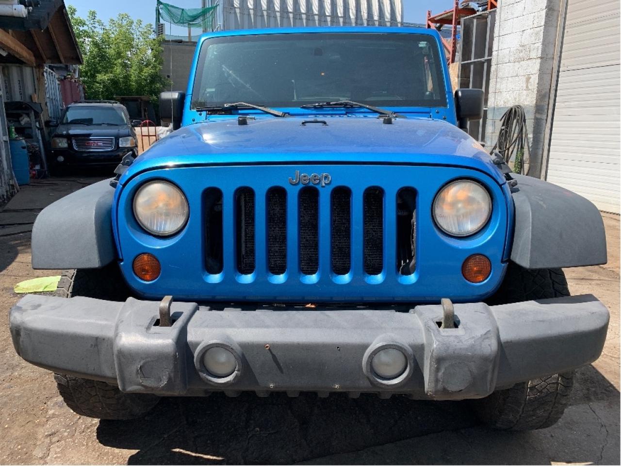 2010 Jeep WRANGLER UNLIMITED 4WD 4dr Islander 6 SPEED TRANS Photo