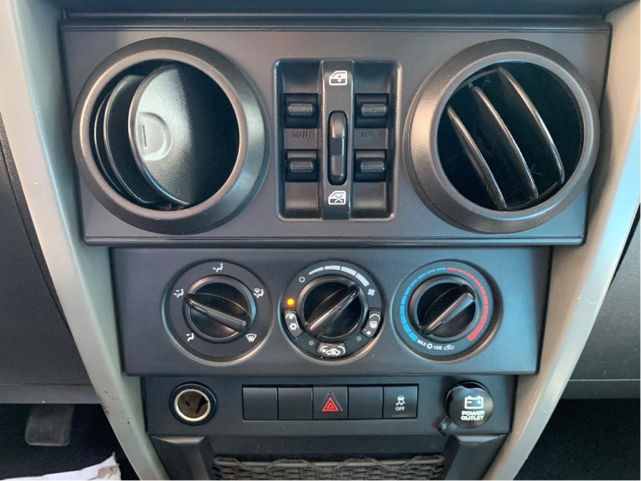 2010 Jeep WRANGLER UNLIMITED 4WD 4dr Islander 6 SPEED TRANS Photo