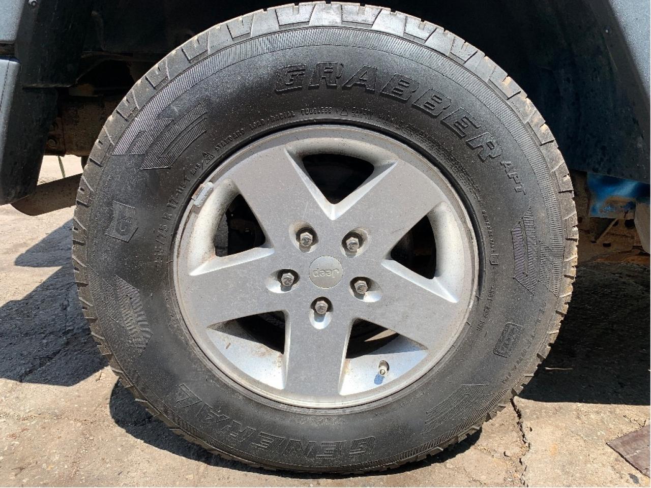 2010 Jeep WRANGLER UNLIMITED 4WD 4dr Islander 6 SPEED TRANS Photo