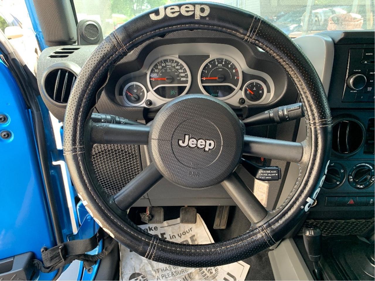 2010 Jeep WRANGLER UNLIMITED 4WD 4dr Islander 6 SPEED TRANS Photo