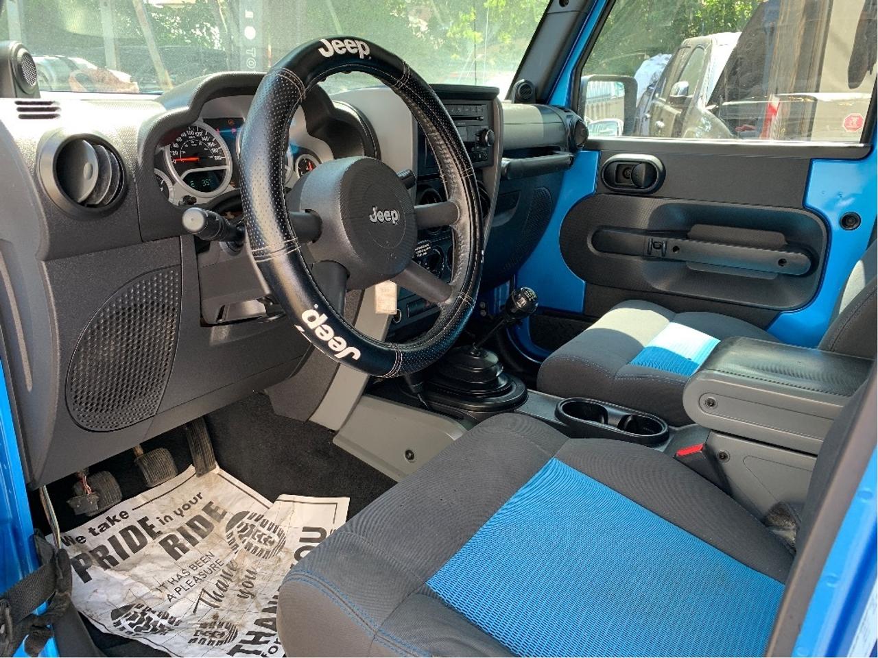 2010 Jeep WRANGLER UNLIMITED 4WD 4dr Islander 6 SPEED TRANS Photo