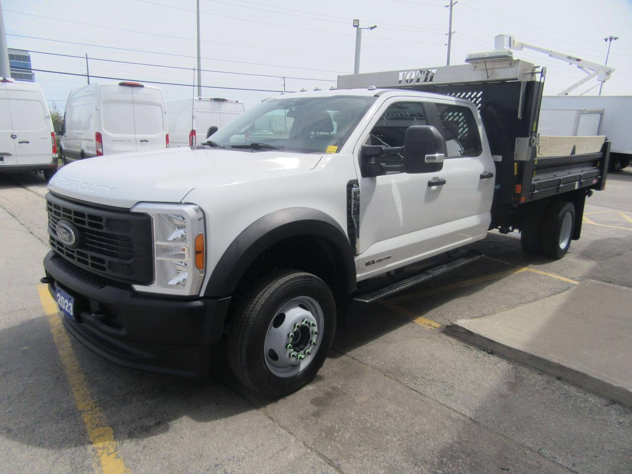 2023 Ford F-550 CREW CAB 4X4 DIESEL WITH 12FT STEEL DUMP BOX Photo