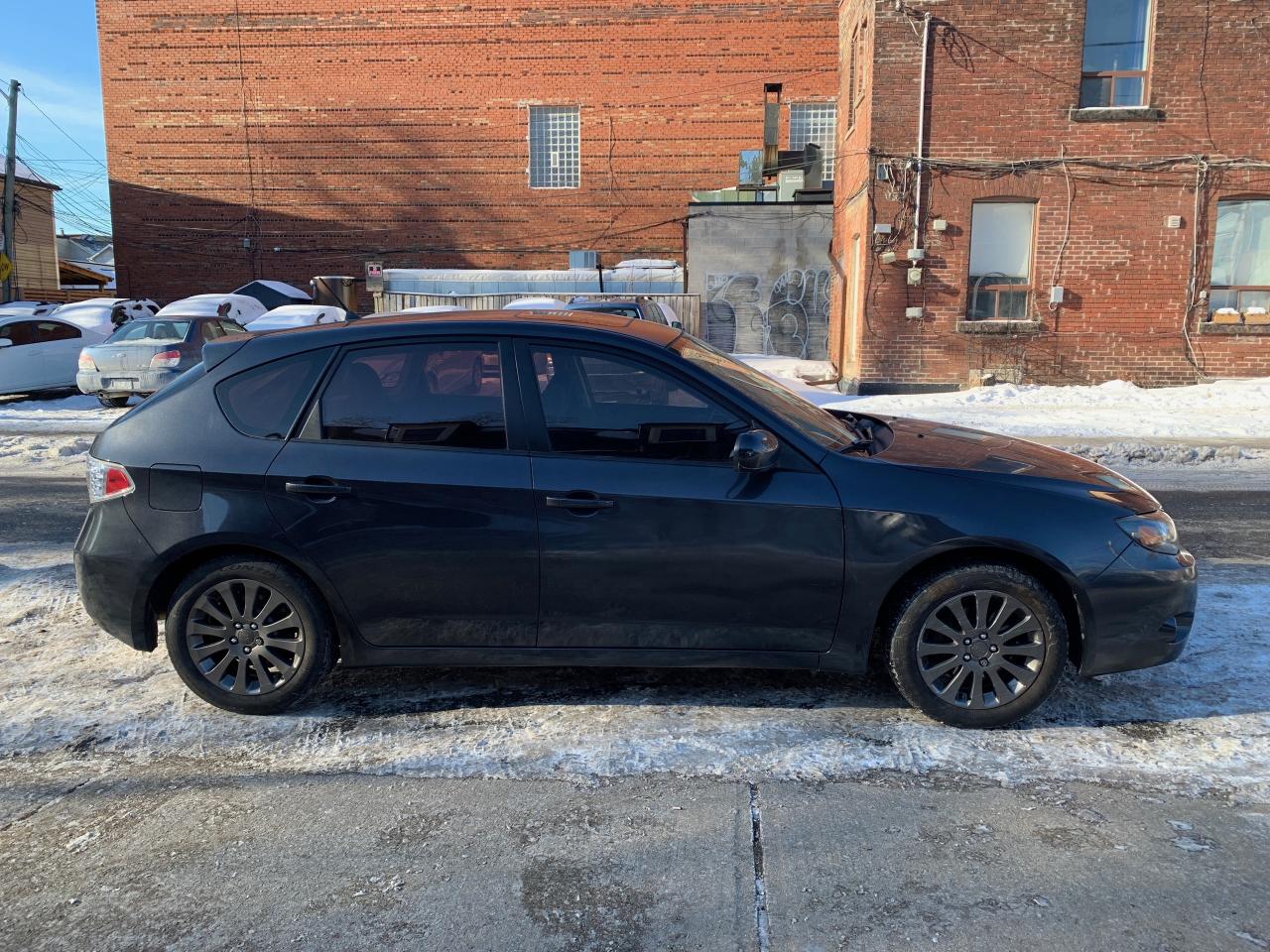 2011 Subaru Impreza 5dr HB Auto 2.5i w-Touring Pkg Photo
