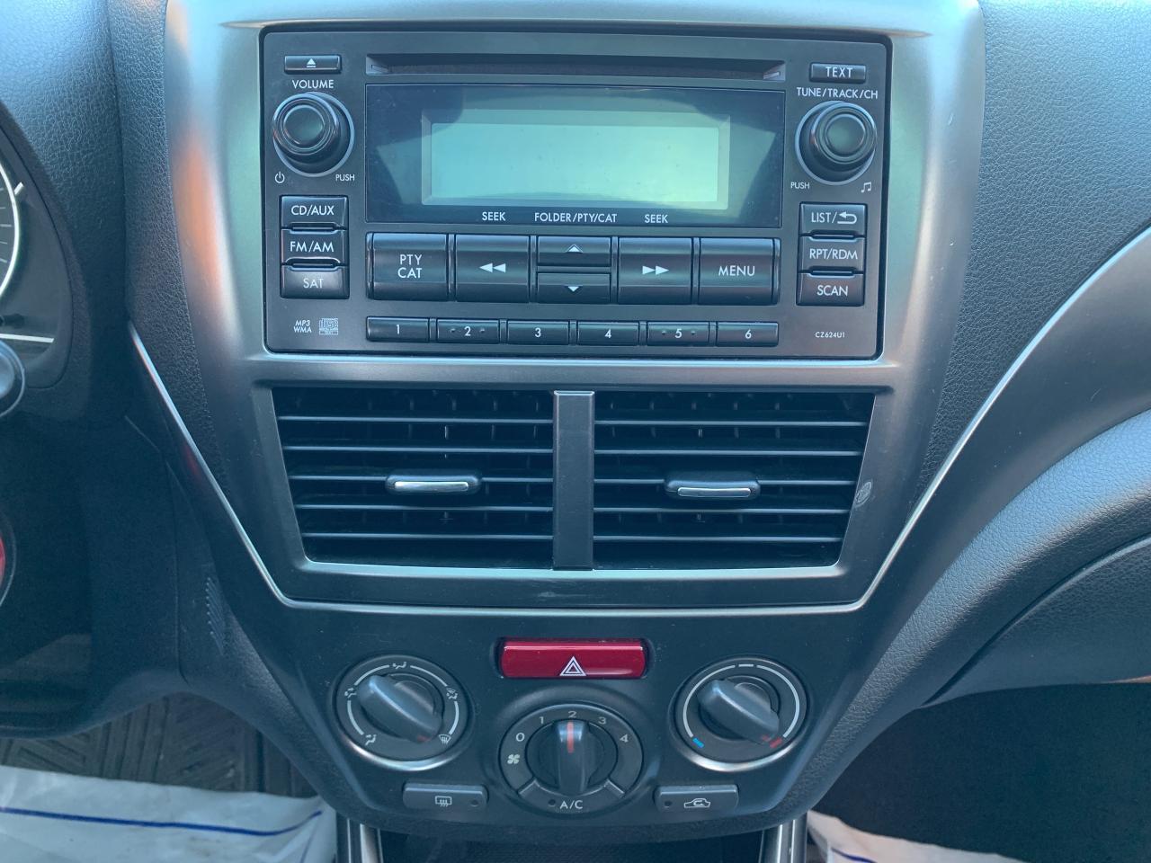 2011 Subaru Impreza 5dr HB Auto 2.5i w-Touring Pkg Photo