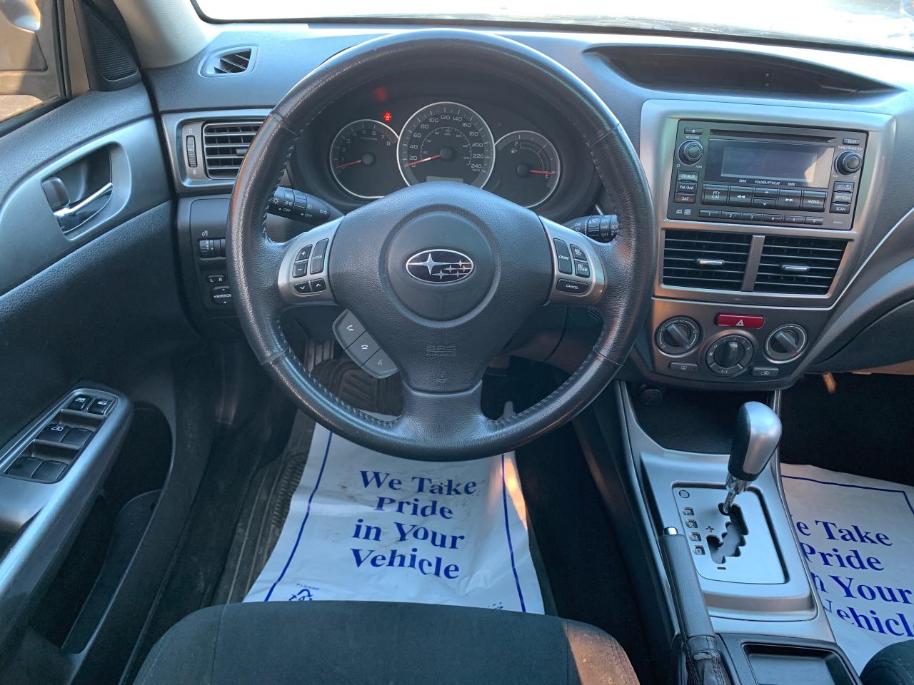 2011 Subaru Impreza 5dr HB Auto 2.5i w-Touring Pkg Photo