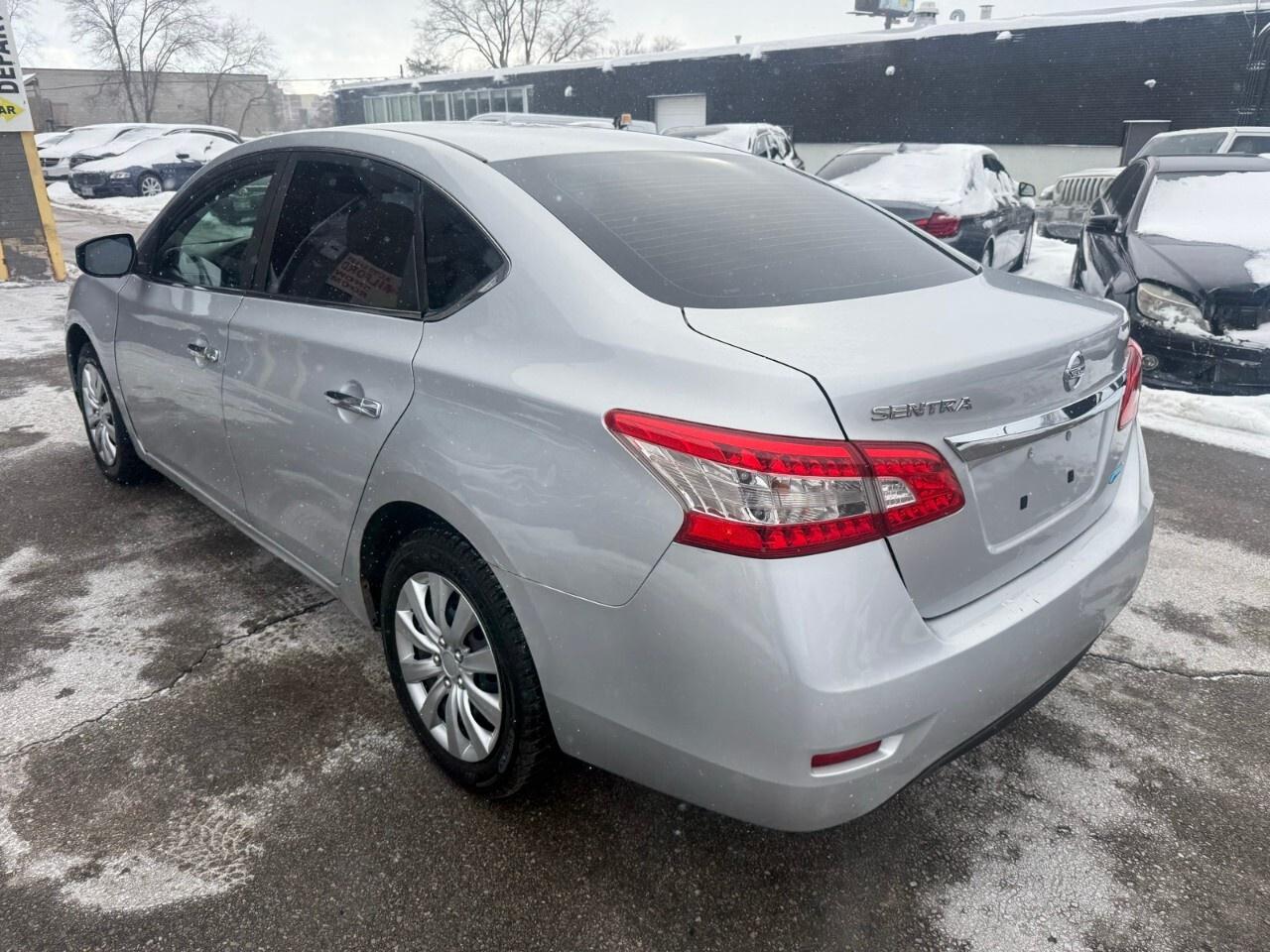 2014 Nissan Sentra 4dr Sdn CVT S 2014 Nissan Sentra Photo