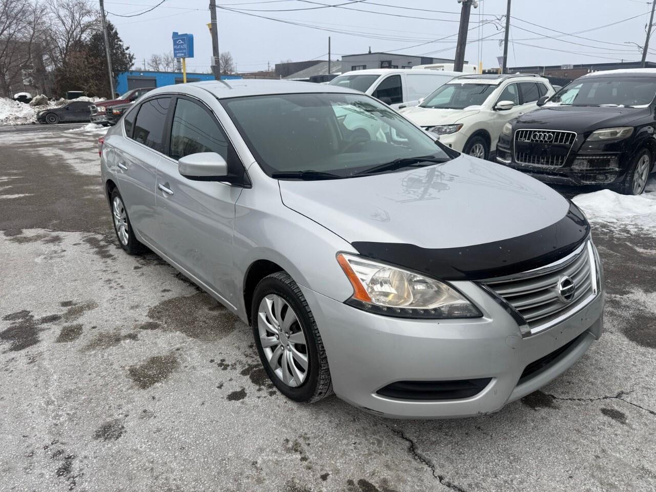 2014 Nissan Sentra 4dr Sdn CVT S 2014 Nissan Sentra Photo