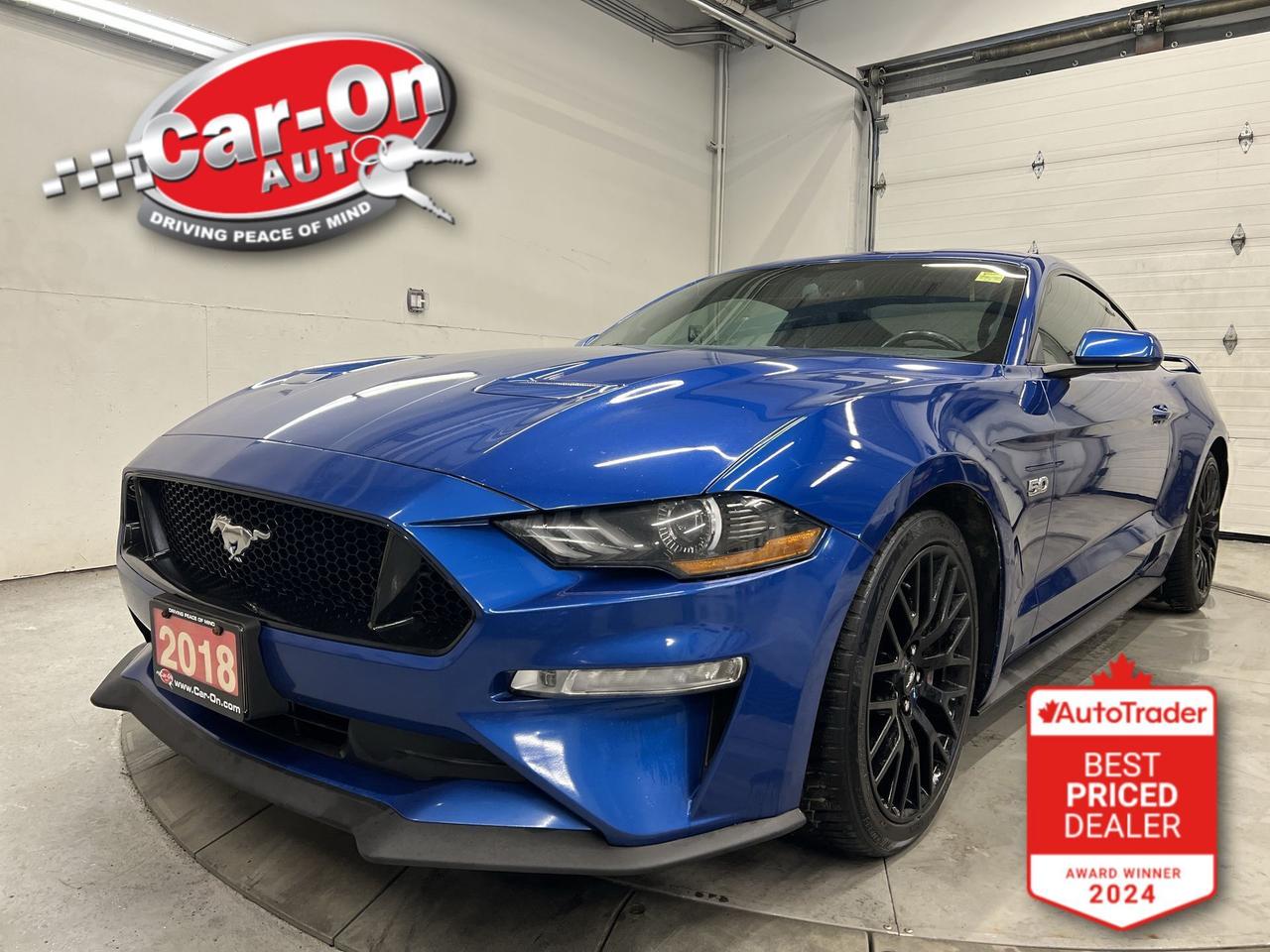 ONLY 90,000KMS!! 6-SPEED MANUAL GT W/ 460HP 5.0L V8!! Bluetooth, 19-inch black alloys, rear park sensors, dual-zone climate control, keyless entry w/ push start, power locks, power mirrors, power windows, automatic headlights, steering and drive mode selector, cruise control and more!!This vehicle just landed and is awaiting a full detail and photo shoot. Contact us and book your road test today!