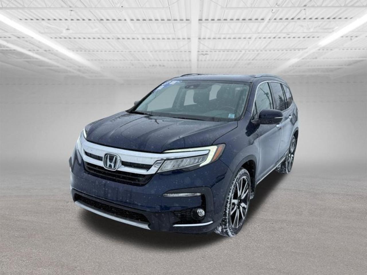 2020 Honda Pilot Touring 8 Passenger | Loaded | Family Ready!Looking for the perfect blend of comfort, reliability, and premium features? This 2020 Honda Pilot Touring 8-Passenger delivers everything your family needs and more.The Honda Pilot Touring trim is where luxury meets practicality, offering advanced technology, spacious seating, and legendary Honda dependability.Highlights & Features:3.5L V6 Engine Smooth, Powerful & Efficient9-Speed Automatic Transmission8-Passenger Seating Perfect for FamiliesLeather-Trimmed InteriorPower MoonroofHeated Front & Rear SeatsHands-Free Power TailgateApple CarPlay & Android AutoRear Entertainment SystemBlind Spot MonitoringMulti-Angle Rearview CameraTri-Zone Automatic Climate ControlSafety FirstHonda Sensing Suite includes:Adaptive Cruise ControlLane Keeping AssistCollision Mitigation Braking SystemRoad Departure MitigationSpace for EveryoneWith flexible 2nd and 3rd row seating plus generous cargo space, this Pilot is road-trip ready, soccer-practice approved, and daily-commute comfortable.Why Buy This Pilot?Legendary Honda ReliabilitySmooth & Quiet RideExcellent Family SUVStrong Resale ValueDont miss your chance to own this well-equipped, spacious, and dependable SUV.Call today to schedule your test drive!Visit us and see why the 2020 Honda Pilot Touring is one of the most trusted 3-row SUVs on the road.