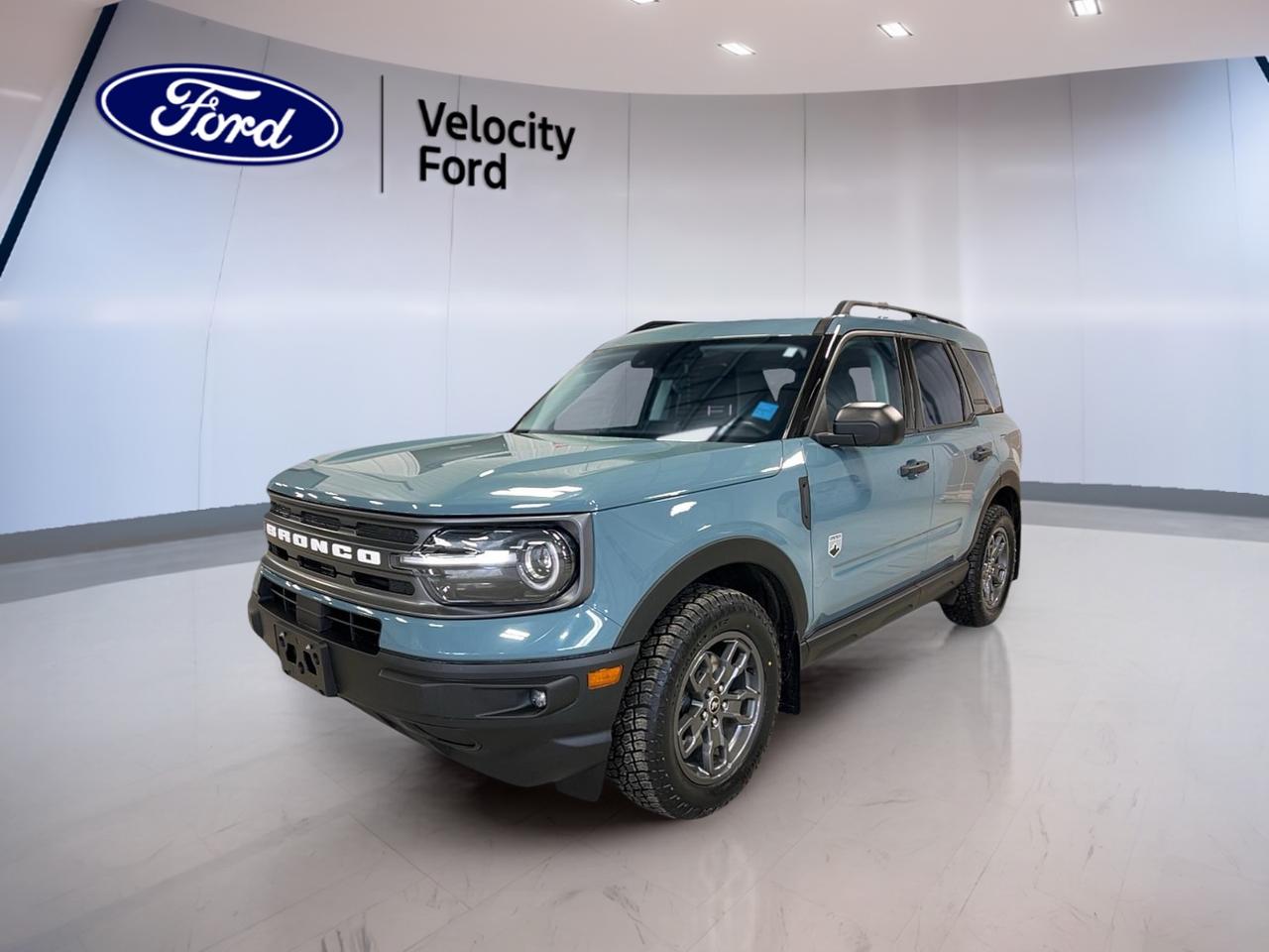Meet the 2023 Ford Bronco Sport Big Bend 4x4, now available at Velocity Ford in Moose Jaw. Finished in blue with a black interior, this 4-door SUV is built for drivers who want everyday comfort with real go-anywhere confidence. With a 1.5 L gas engine and an 8-speed automatic transmission, it delivers smooth power for city streets and steady control when the road turns rough. This used Bronco Sport Big Bend 4x4 also includes off-road tires and Four-Wheel Drive (4WD), so you can plan weekend escapes with less worry and more fun.

Inside, the 2023 Ford Bronco Sport Big Bend 4x4 keeps things simple, practical, and easy to enjoy. You get heated front seats for cold Saskatchewan mornings, automatic climate control for set-and-forget comfort, and push button start for quick departures. The cabin is designed to feel open and functional, with smart storage and easy access through all four doors. With tinted windows and ambient lighting, it also feels more relaxed on longer drives.

FEATURES OF THE Bronco Sport Big Bend 4x4  
»» Four-Wheel Drive for year-round traction  
»» Off-road tires for confident grip  
»» 1.5 L gas engine power  
»» 8-speed automatic shifting smoothness  

ADVANCED SAFETY FEATURES  
»» Anti-Lock Braking System for controlled stops  
»» Stability Control helps maintain steady handling  
»» Blind Spot Monitor for safer lane changes  
»» Lane Departure Warning alerts drifting risk  

PERFORMANCE AND EFFICIENCY  
»» 1.5 L gas engine for daily driving  
»» Automatic Transmission - 8 Speed operation  
»» Power Steering for easy low-speed turns  
»» Tire Pressure Monitoring helps reduce wear  

COMFORT AND CONVENIENCE  
»» Heated front seats for winter comfort  
»» Automatic climate control maintains set temperature  
»» Drivers seat lumbar support reduces fatigue  
»» Drivers side power seat adjustability  

TECHNONOLGY AND CONNECTIVITY  
»» Bluetooth Integration for hands-free calls  
»» Steering wheel audio controls within reach  
»» Satellite Radio for more listening choice  
»» WiFi Hotspot helps keep you connected  

CARGO SPACE  
»» Rear trunk access makes loading simple  
»» Four doors ease passenger entry  
»» Spare tire included for added confidence  
»» Power windows for quick ventilation  

WHAT OTHER OWNERS LIKE  
»» Confident traction from Four-Wheel Drive  
»» Easy-to-use controls and clear layout  
»» Comfortable ride for daily commuting  
»» Helpful driver-assist safety technology  

This 2023 Ford Bronco Sport Big Bend 4x4s VIN is: 3FMCR9B64PRD02695.